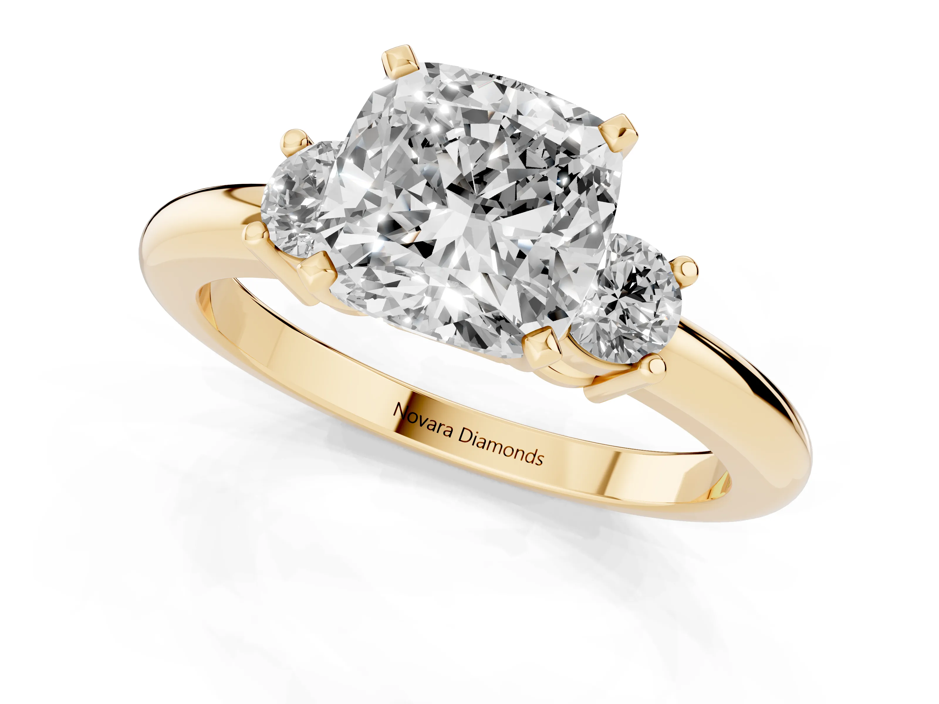 Three-Stone Cushion Cut Diamond Ring Set in Yellow gold with Prong Setting and Plain Band