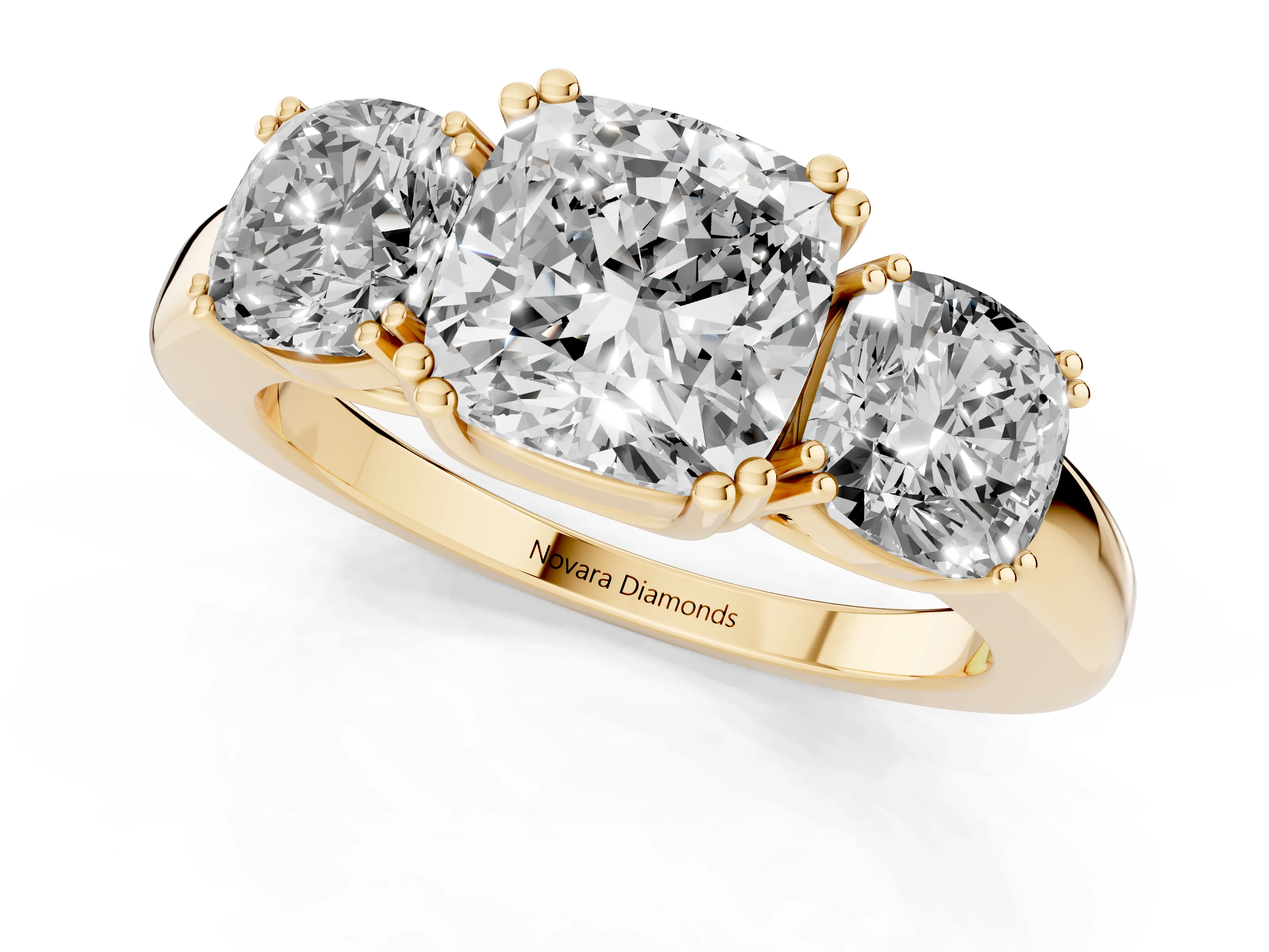 Cushion Cut Diamond Three-Stone Ring Set in Yellow gold with Polished Band and Prong Setting