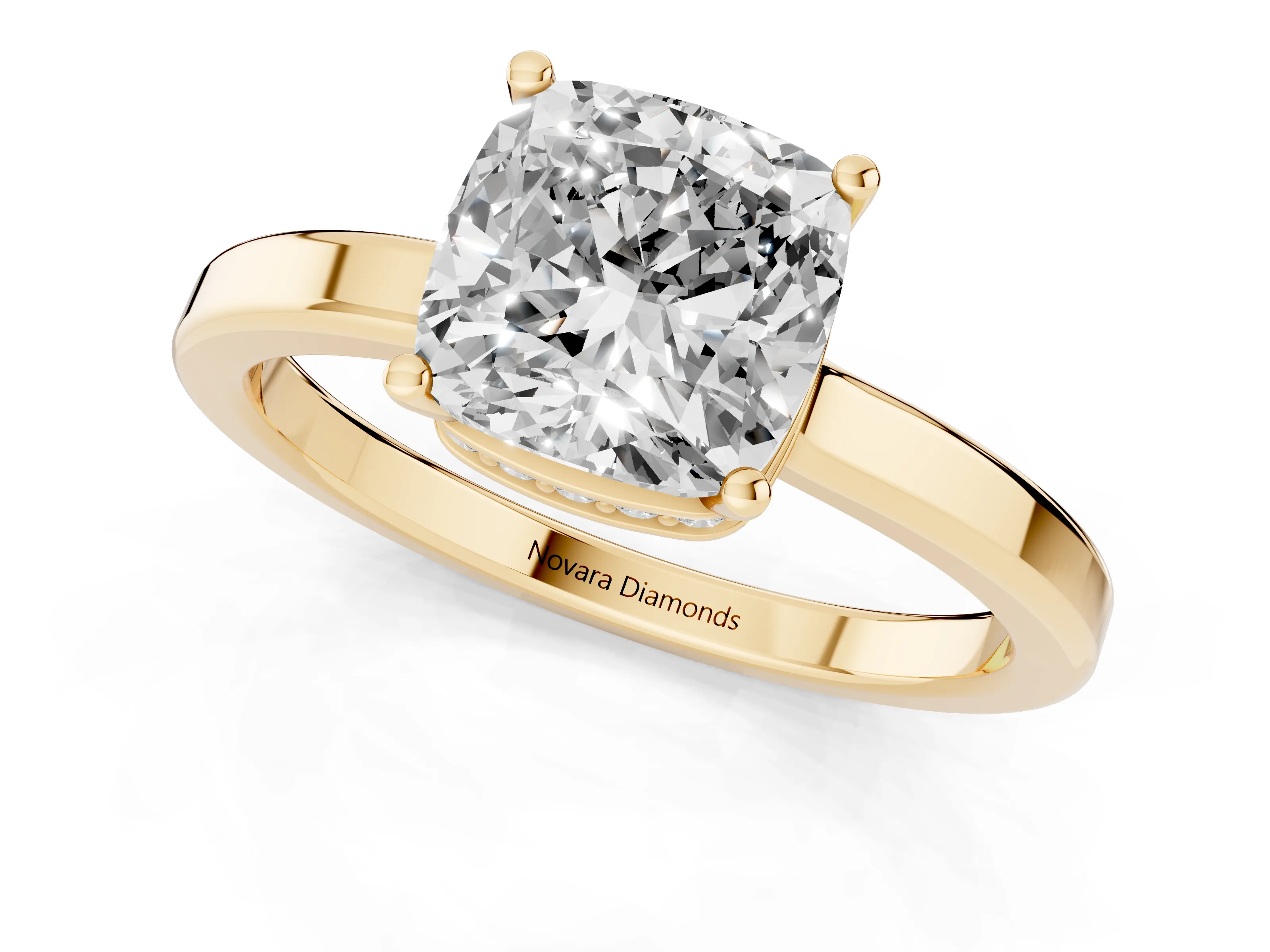 Cushion Cut Diamond Solitaire Engagement Ring Set in Yellow gold with Prong Setting on a Plain Band