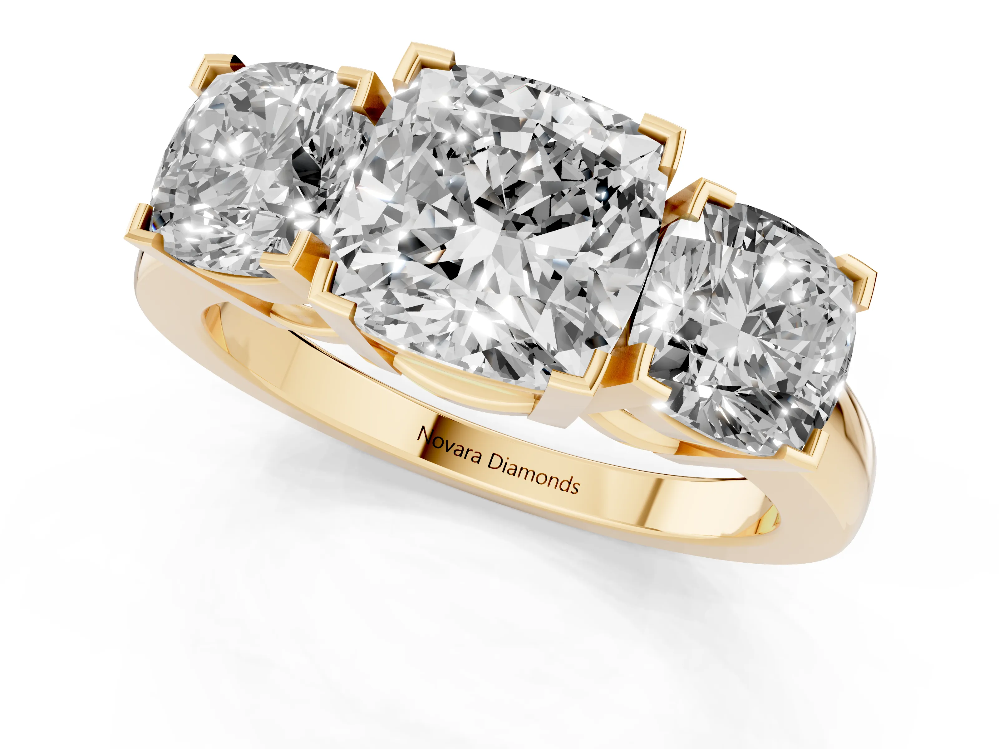 Cushion Cut Diamond Three-Stone Ring Set in Yellow gold with Channel-Set Band and Prong Settings
