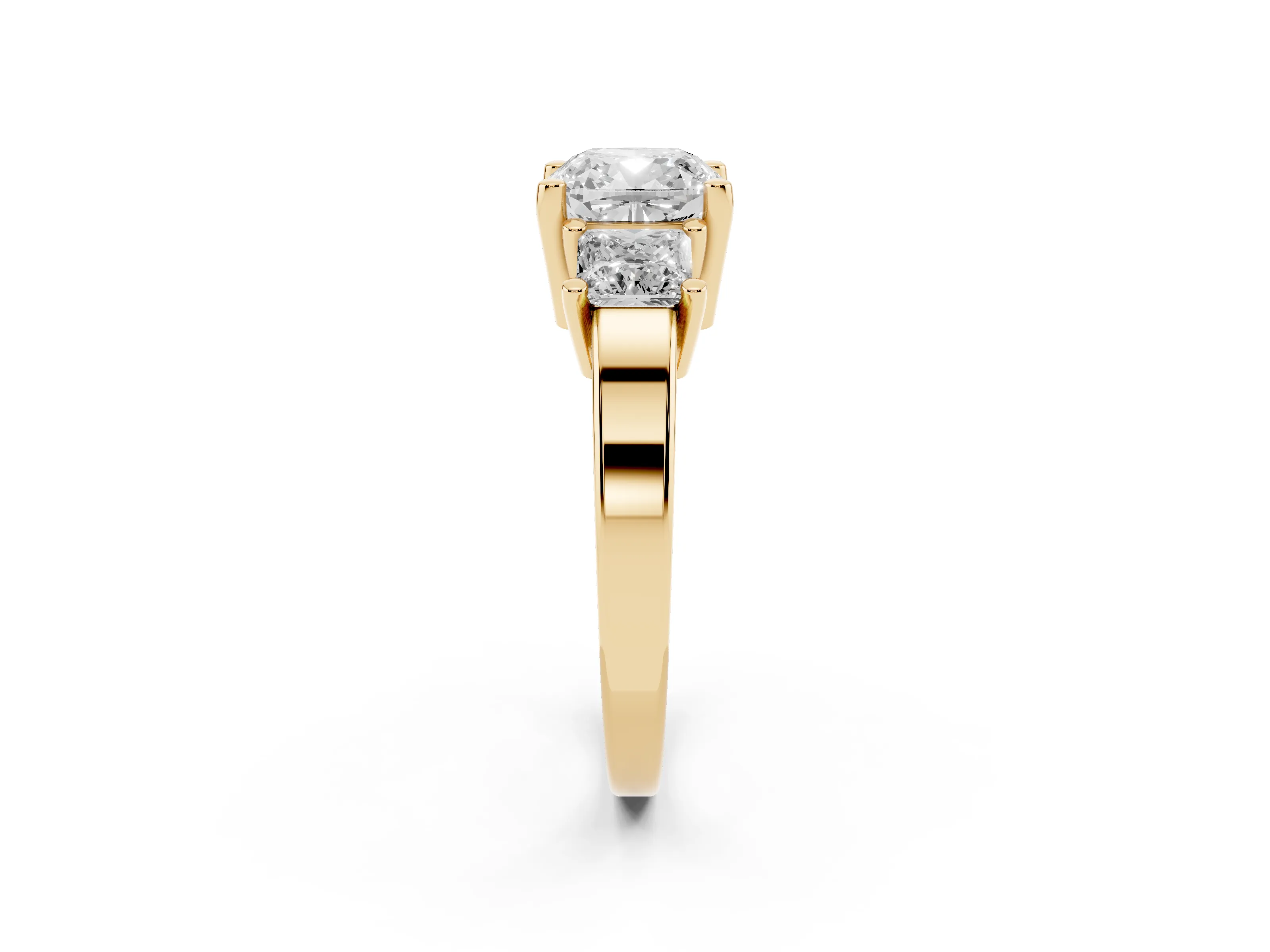 Three-Stone Cushion Cut Diamond Solitaire Ring Set in Yellow gold with Prong Setting