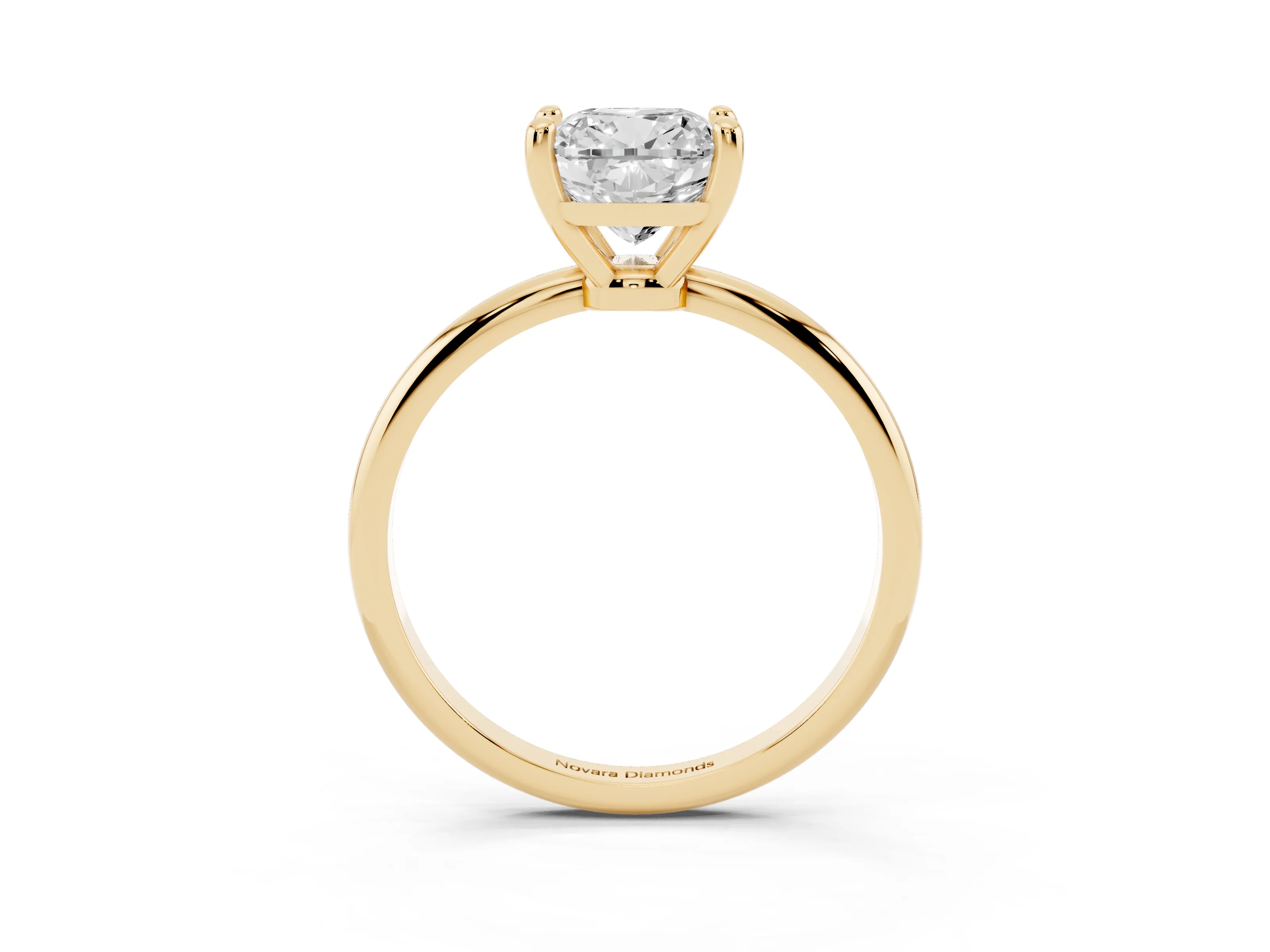 Cushion Cut Diamond Solitaire Ring Set in Yellow gold with Secure Prong Setting on a Classic Band