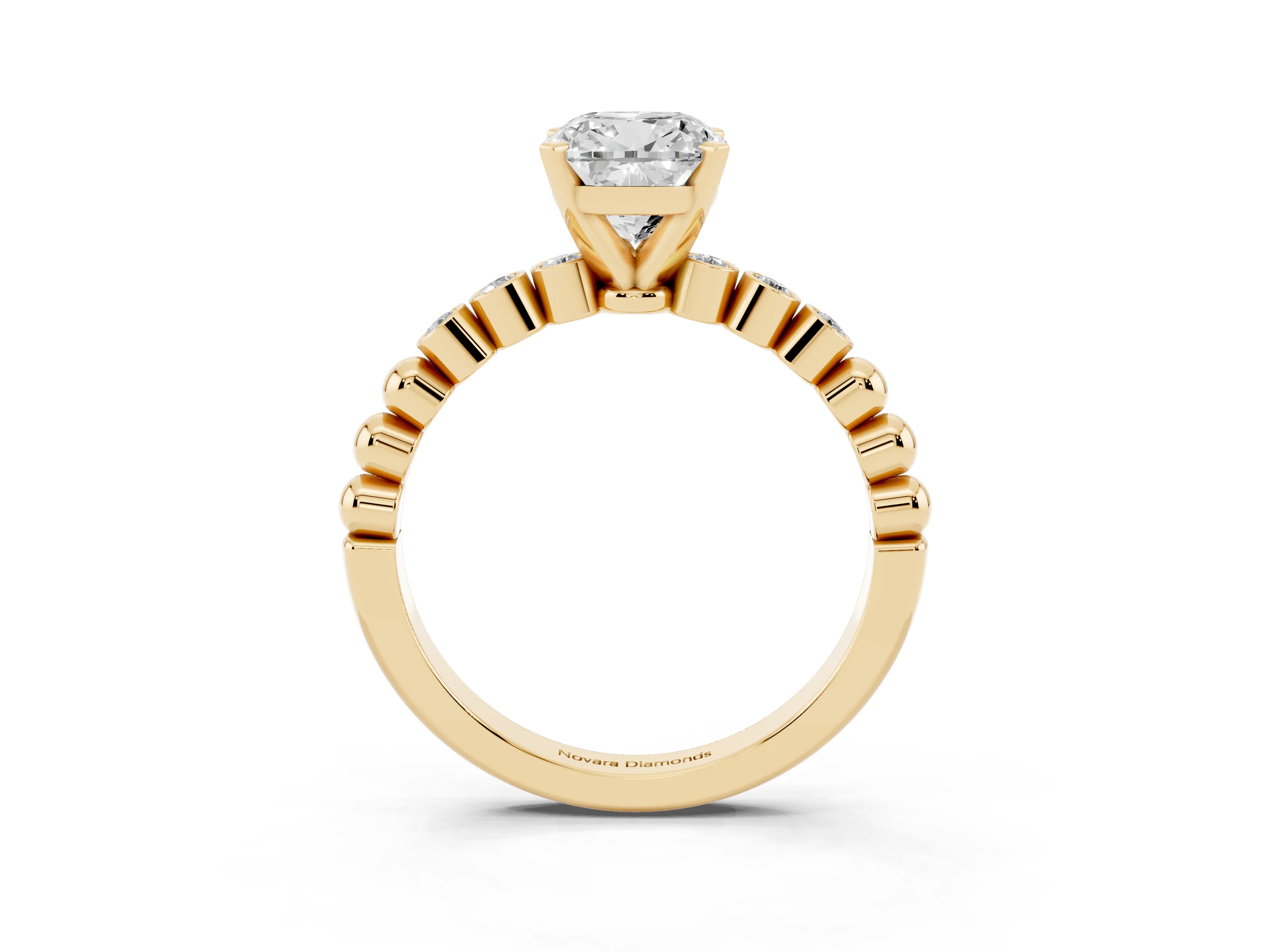 Cushion Cut Diamond Solitaire Engagement Ring Set in Yellow gold with Bezel Accents on Beaded Band