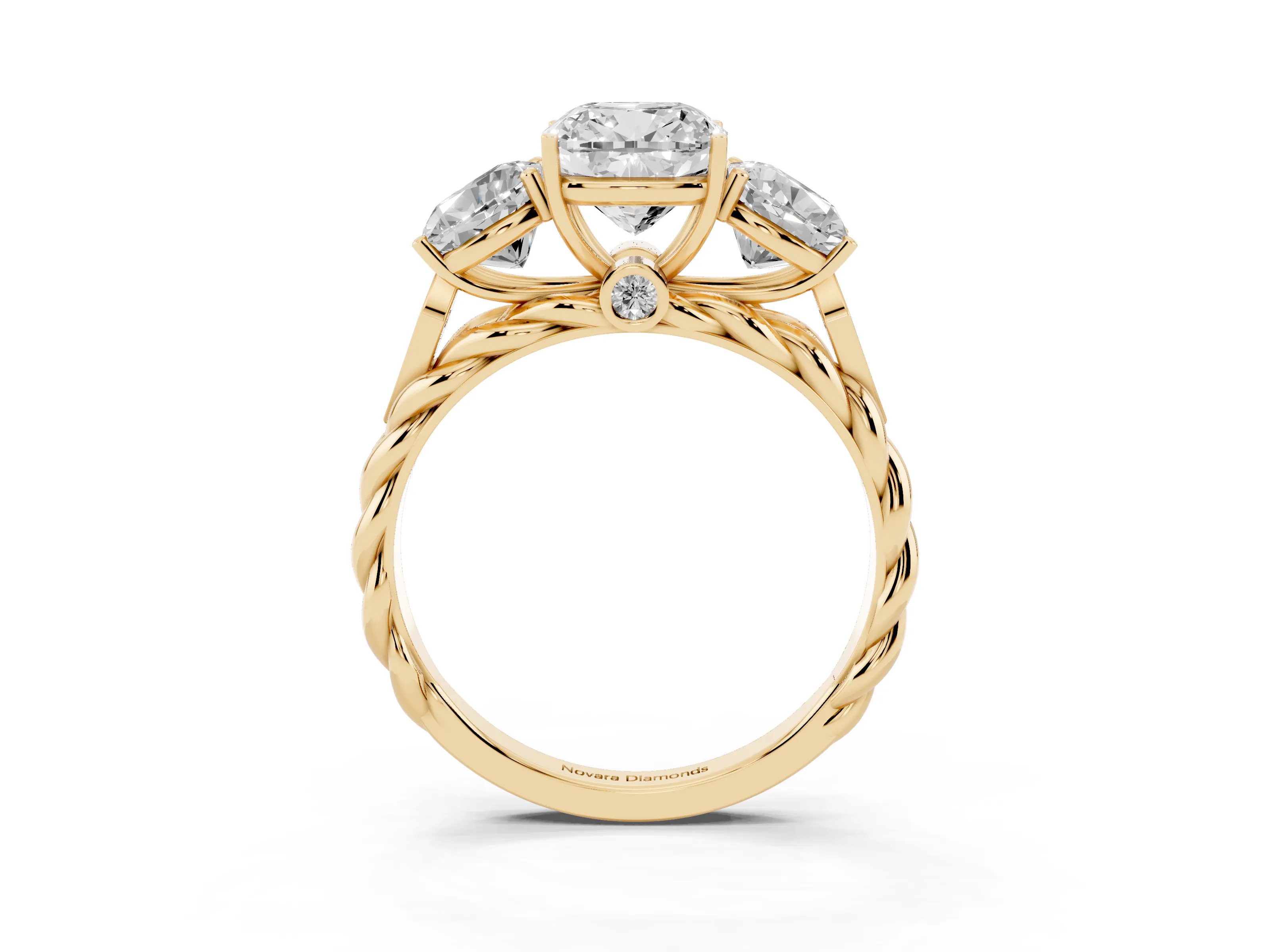 Cushion Cut Diamond Three-Stone Ring Set in Yellow gold with Braided Band