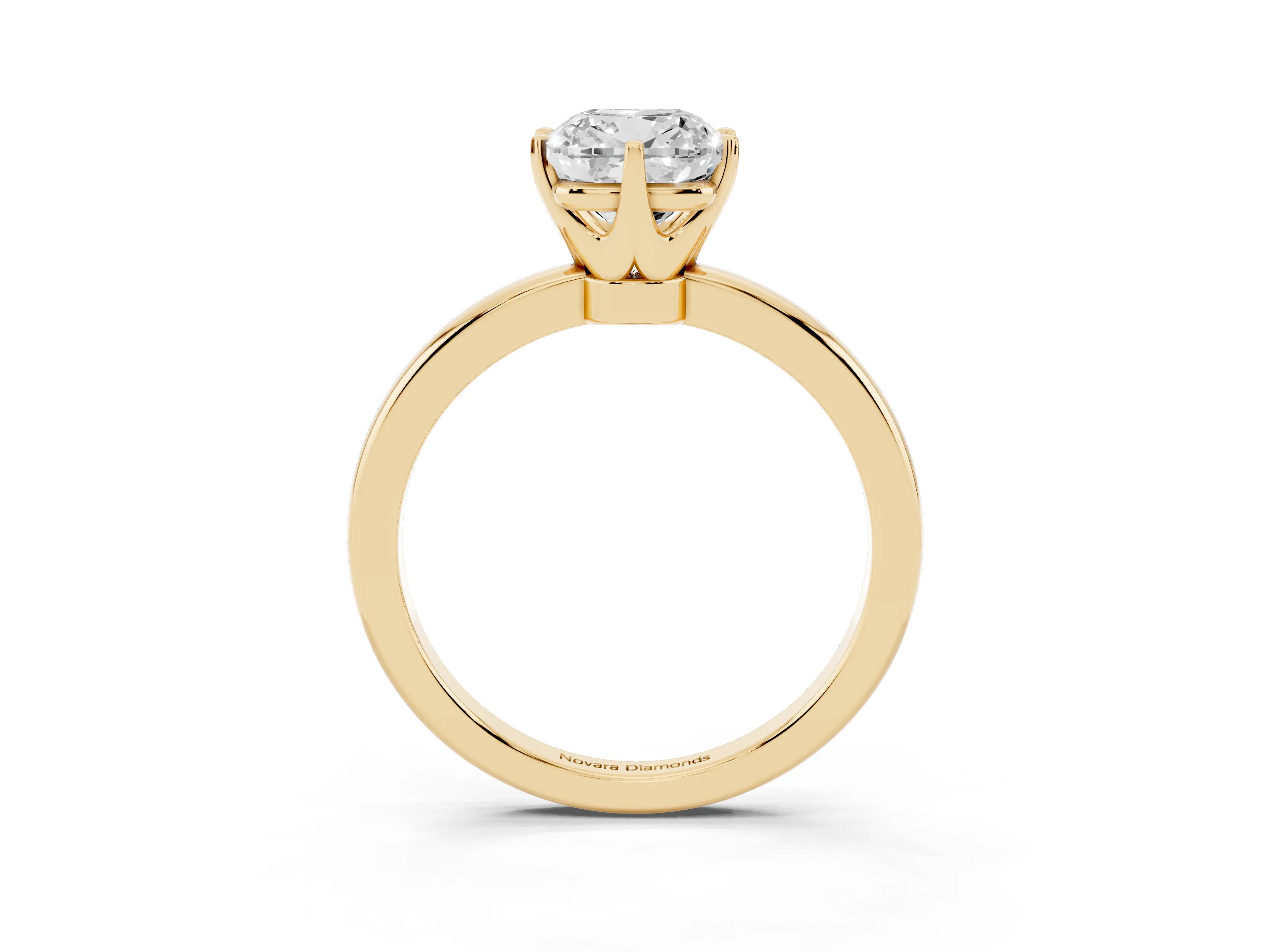 Cushion Cut Diamond Solitaire Ring Set in Yellow gold with Raised Prong Setting on a Classic Band