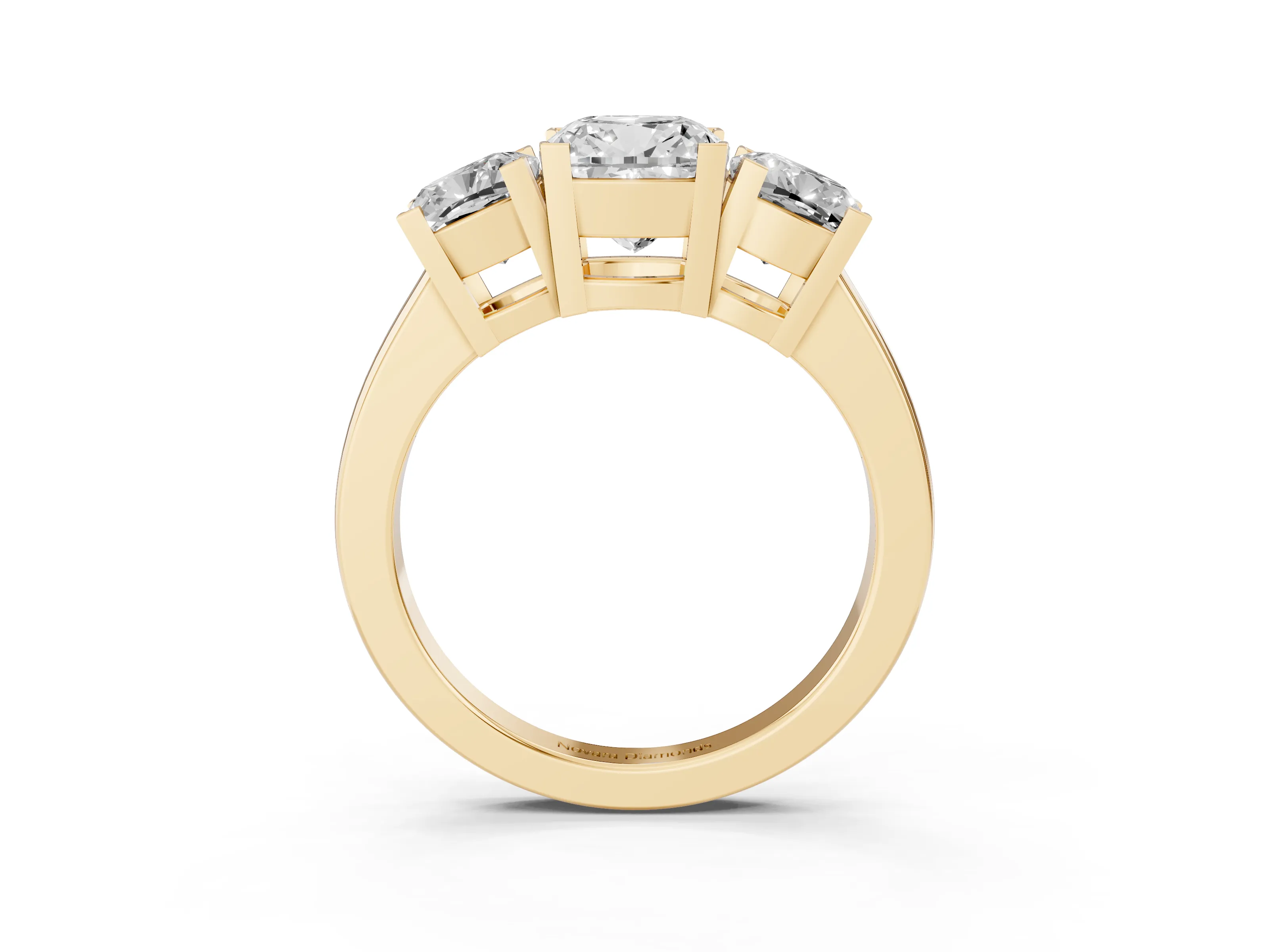 Cushion Cut Diamond Three-Stone Ring Set in Yellow gold with Channel-Set Band and Prong Settings