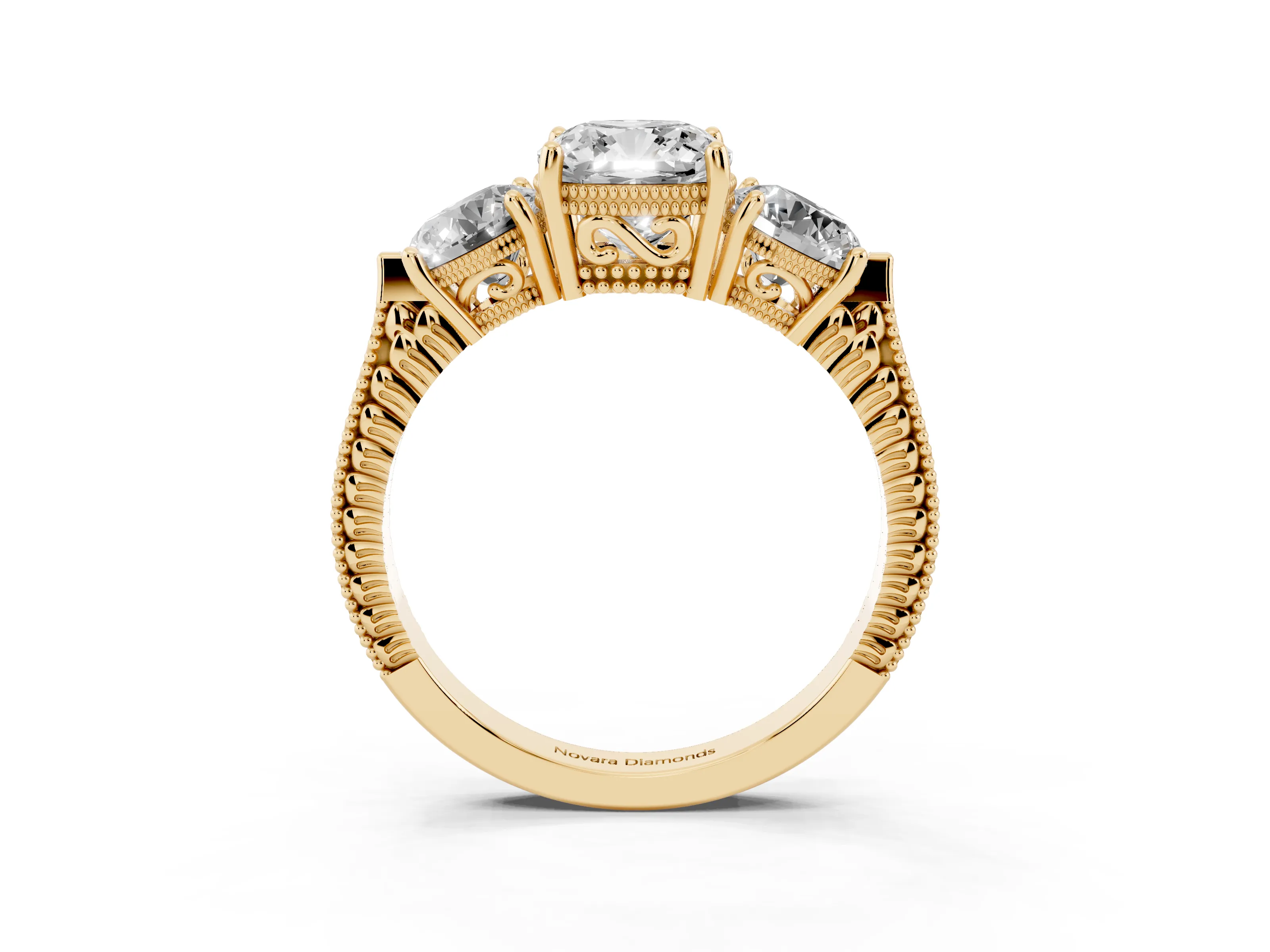 Cushion Cut Diamond Three-Stone Ring Set in Yellow gold with Milgrain Band