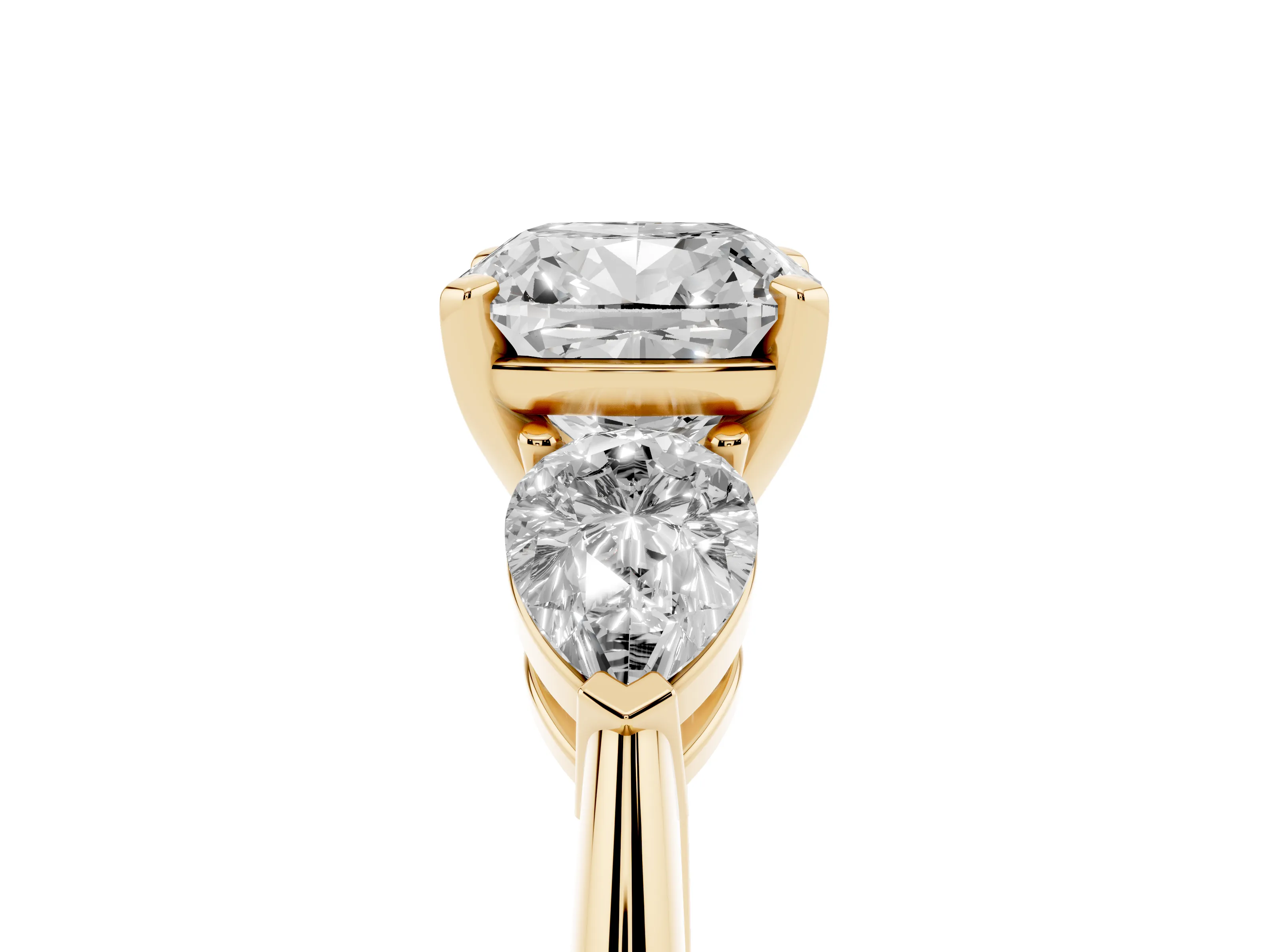 Three-Stone Cushion Cut Diamond Ring Set in Yellow gold with Pear Side Stones and Prong Setting