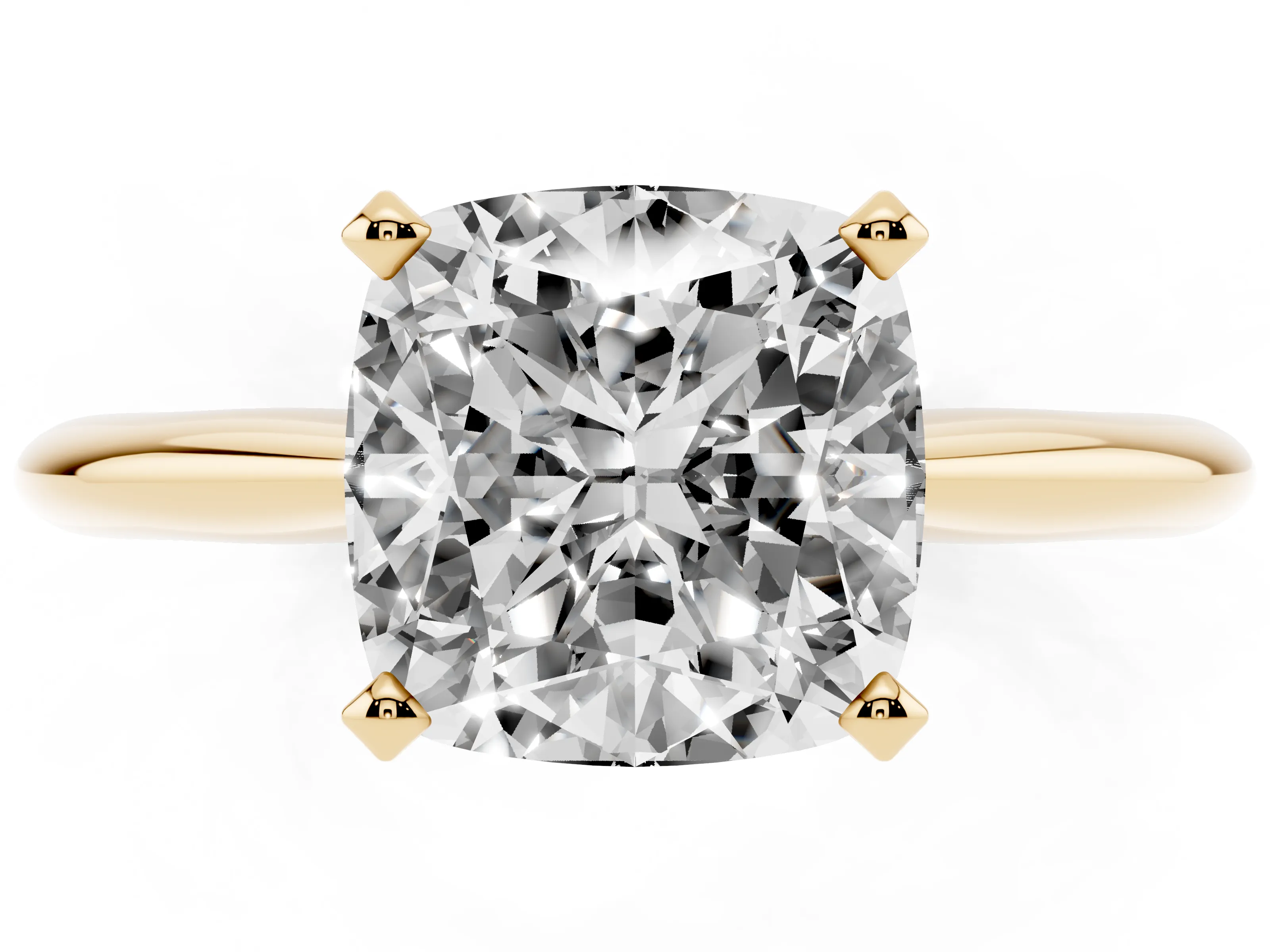 Cushion Cut Diamond Solitaire Ring Set in Yellow gold with Prong Setting on a Plain Round Band