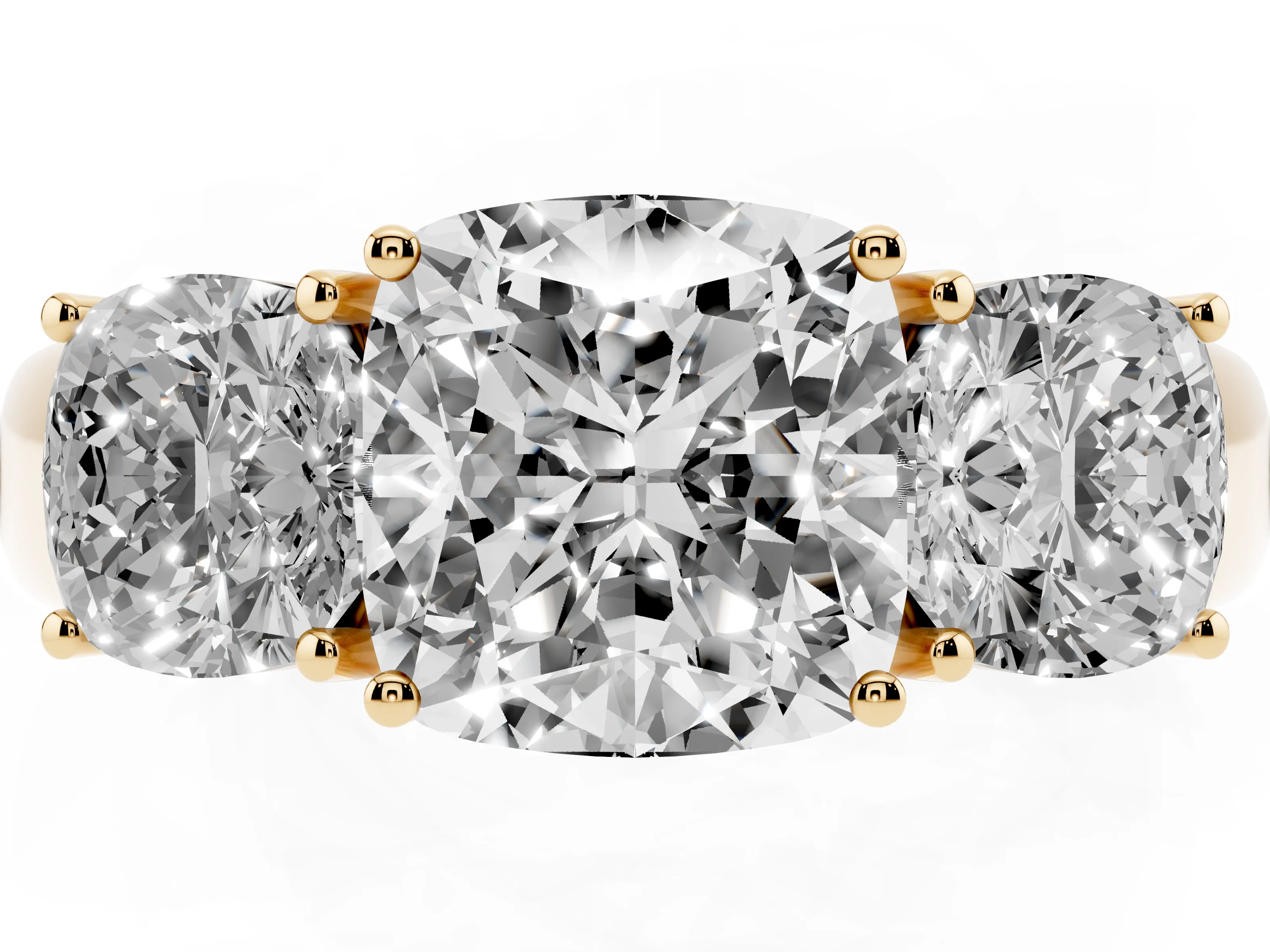 Three-Stone Cushion Cut Diamond Ring Set in Yellow gold with Matching Prong Settings and Plain Band
