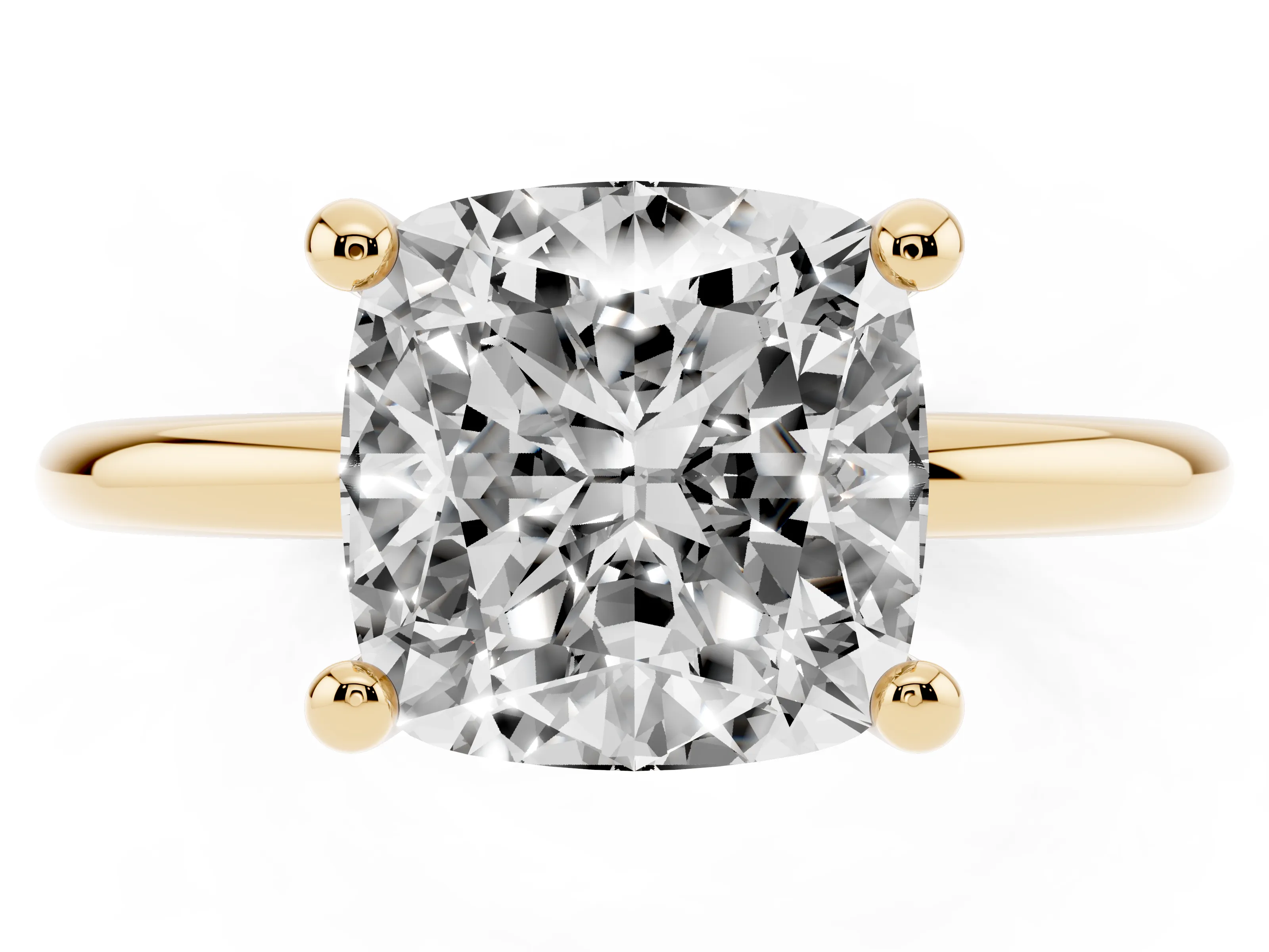 Cushion Cut Diamond Solitaire Ring Set in Yellow gold with Secure Prong Setting on a Classic Band