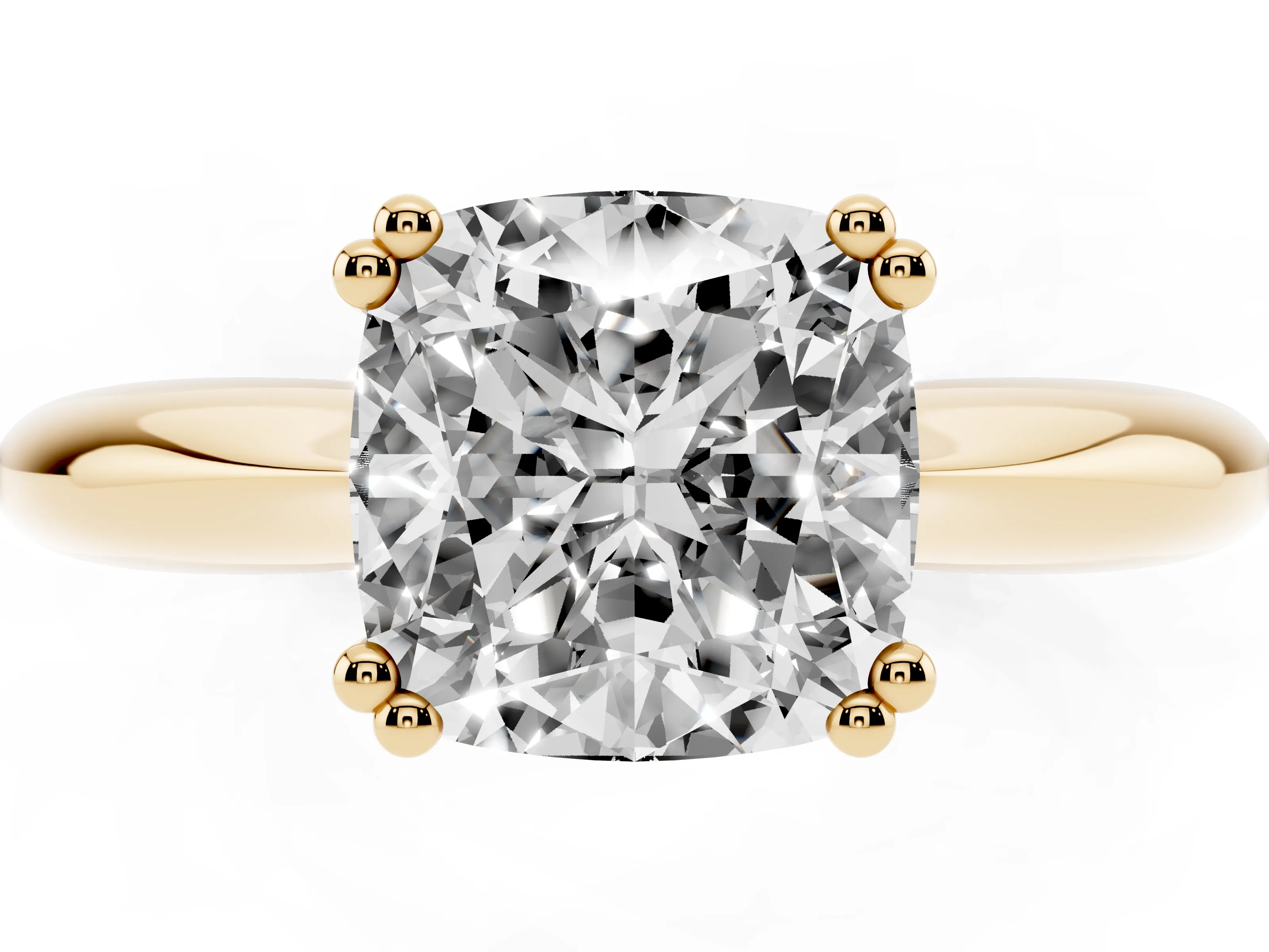 Cushion Cut Diamond Solitaire Engagement Ring Set in Yellow gold with Tapered Band and Prong Setting