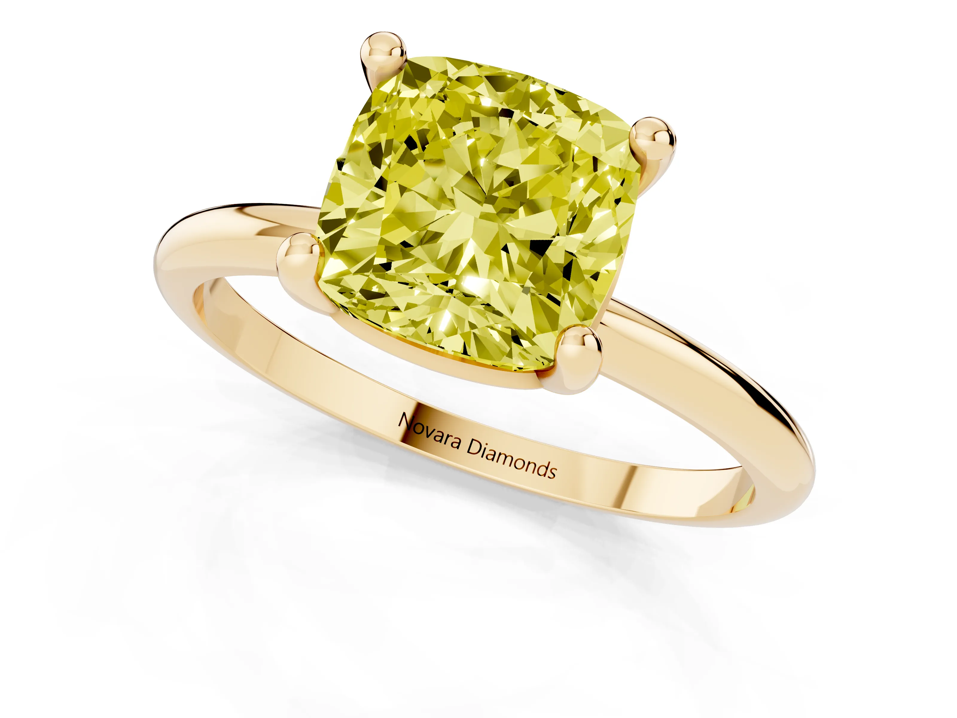 Fancy Yellow Cushion Cut Diamond Solitaire Ring Set in Yellow gold with Secure Prong Setting on a Classic Band