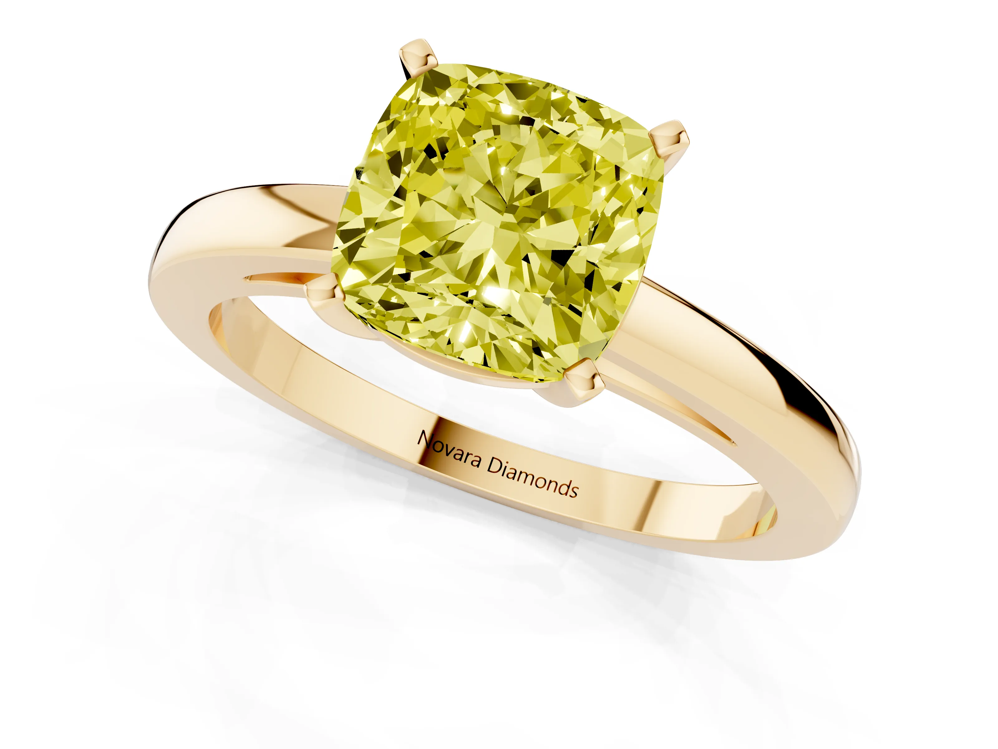 Fancy Yellow Cushion Cut Diamond Solitaire Engagement Ring Set in Yellow gold with Prong Setting on a Classic Band