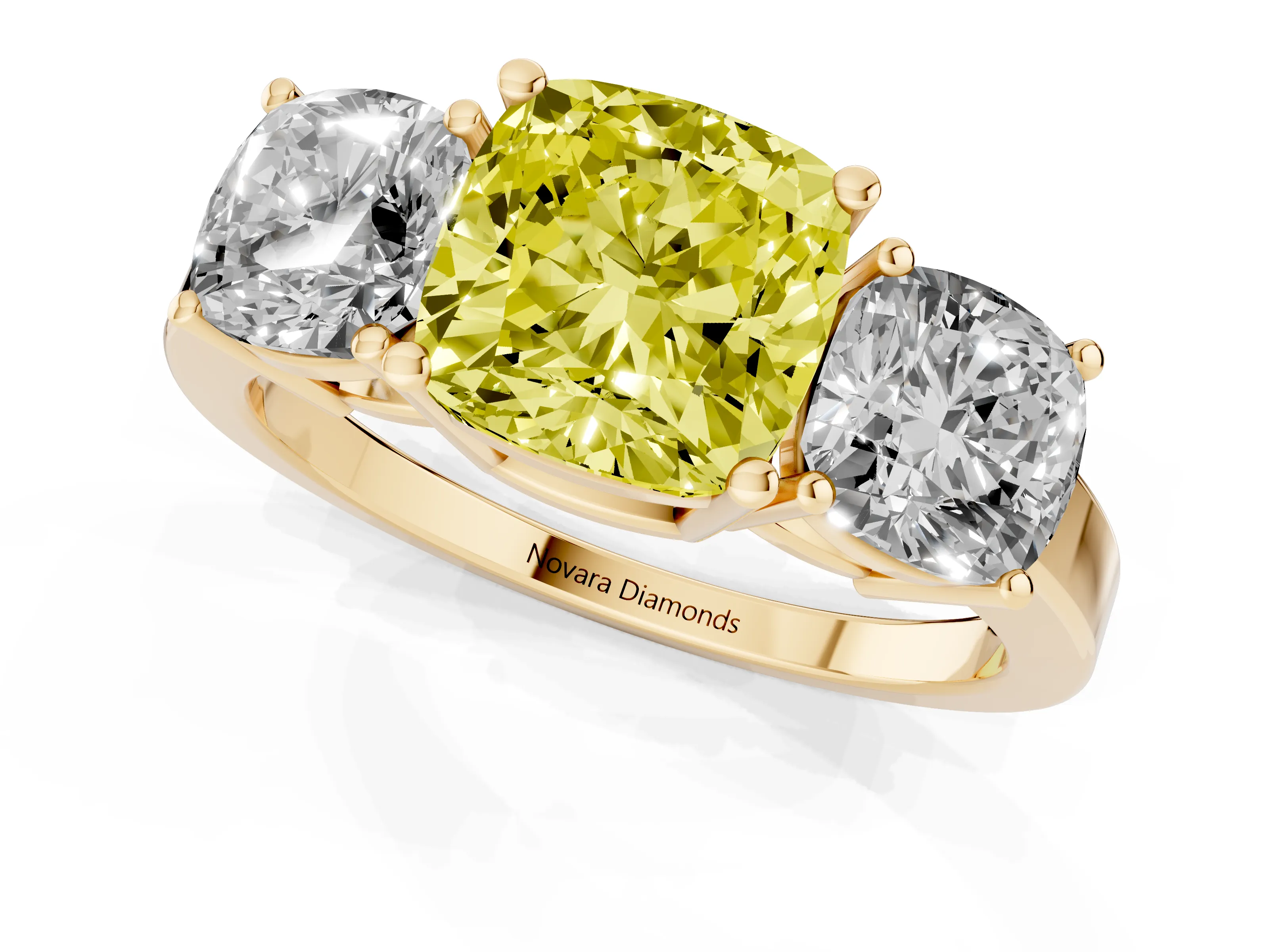 Fancy Yellow Cushion Cut Diamond Three-Stone Engagement Ring Set in Yellow gold with Flat Band