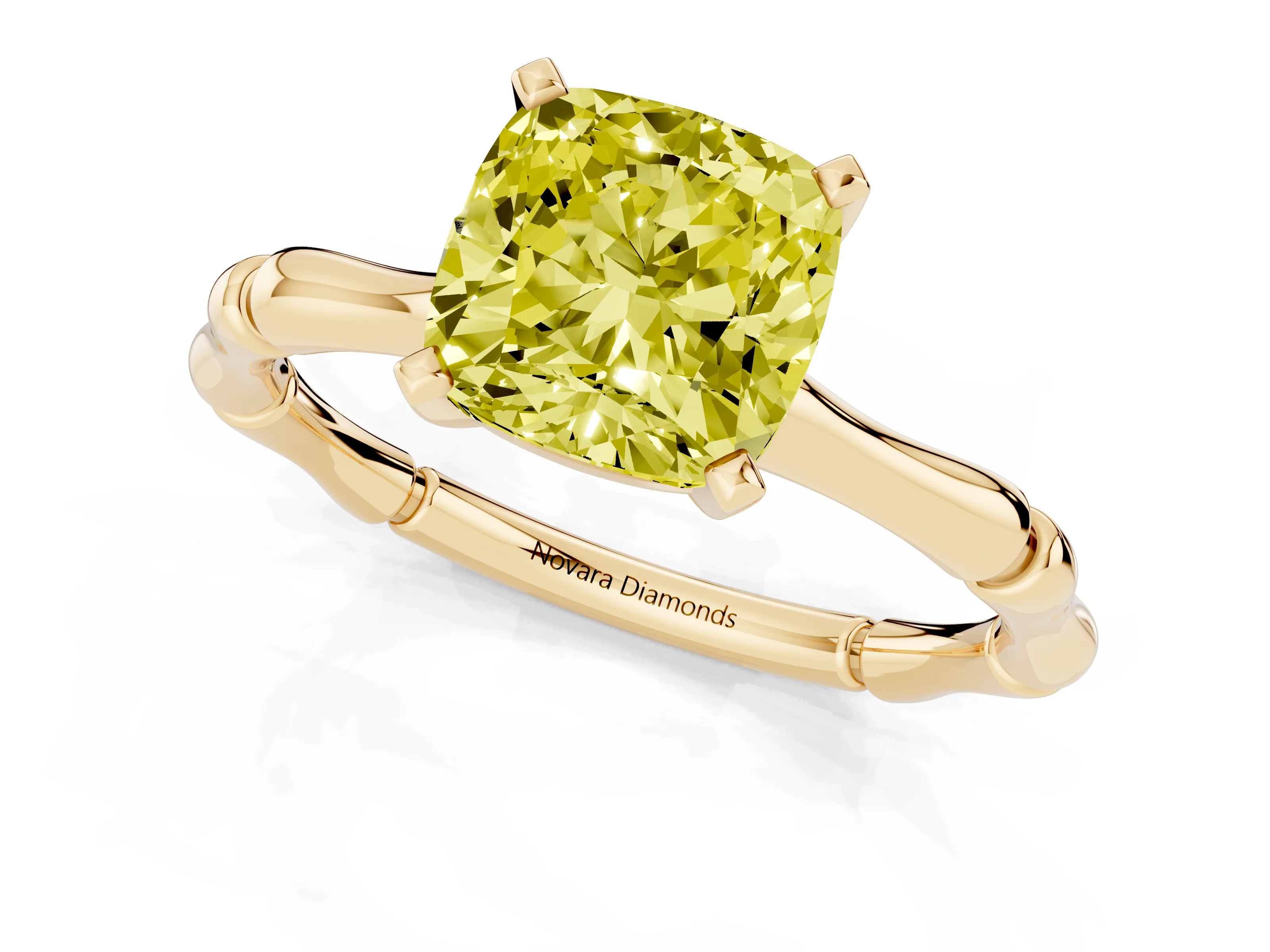 Fancy Yellow Cushion Cut Diamond Solitaire Ring Set in Yellow gold with Bamboo Band and Prong Setting