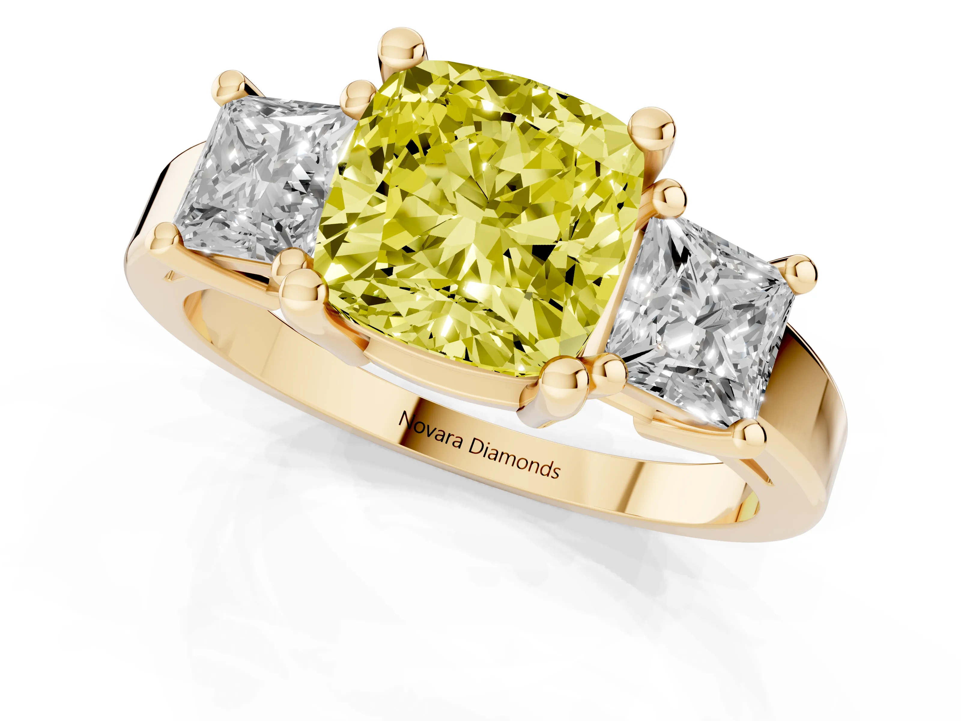 Fancy Yellow Three-Stone Cushion Cut Diamond Solitaire Ring Set in Yellow gold with Prong Setting