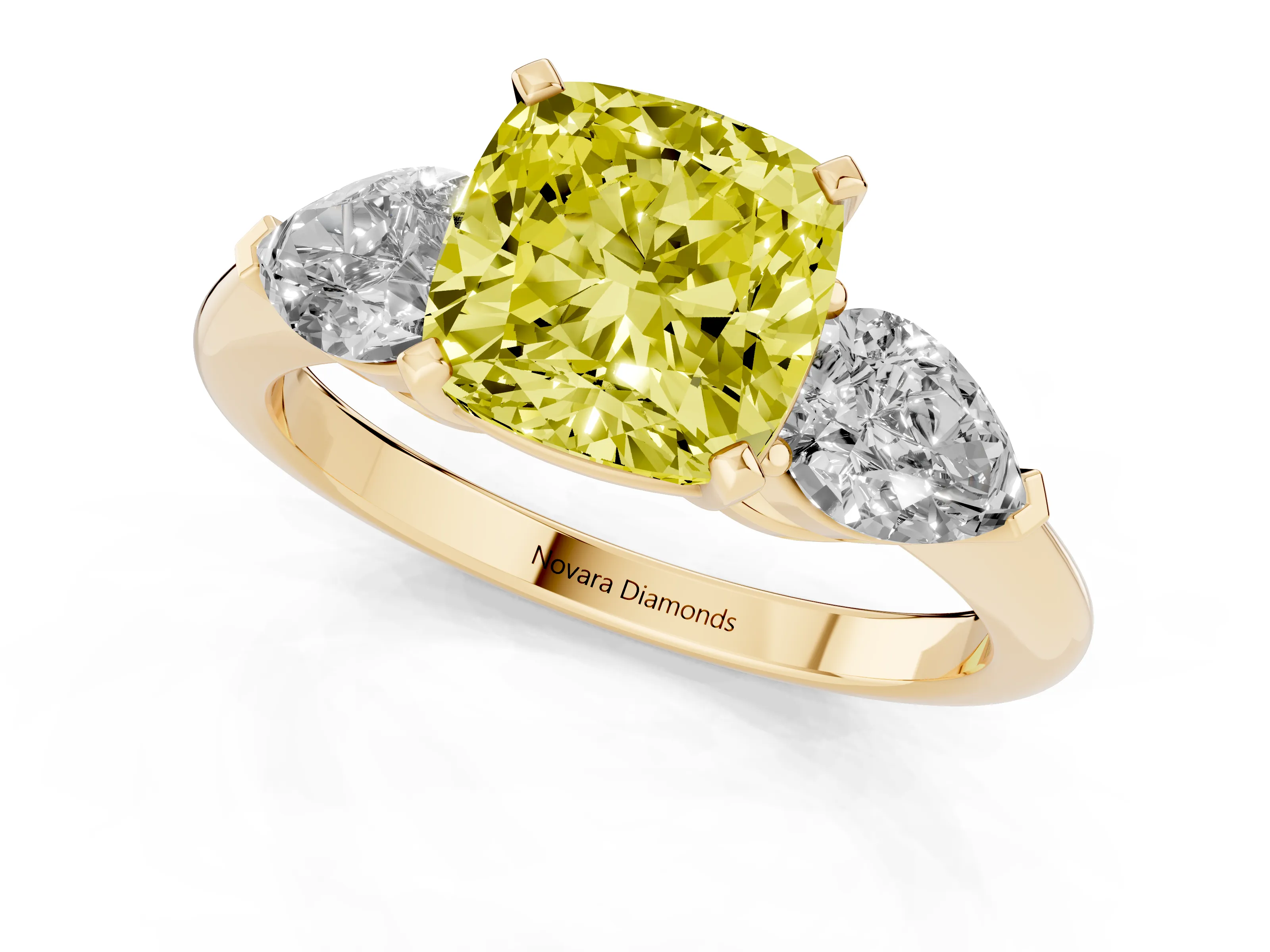 Fancy Yellow Three-Stone Cushion Cut Diamond Ring Set in Yellow gold with Pear Side Stones and Prong Setting