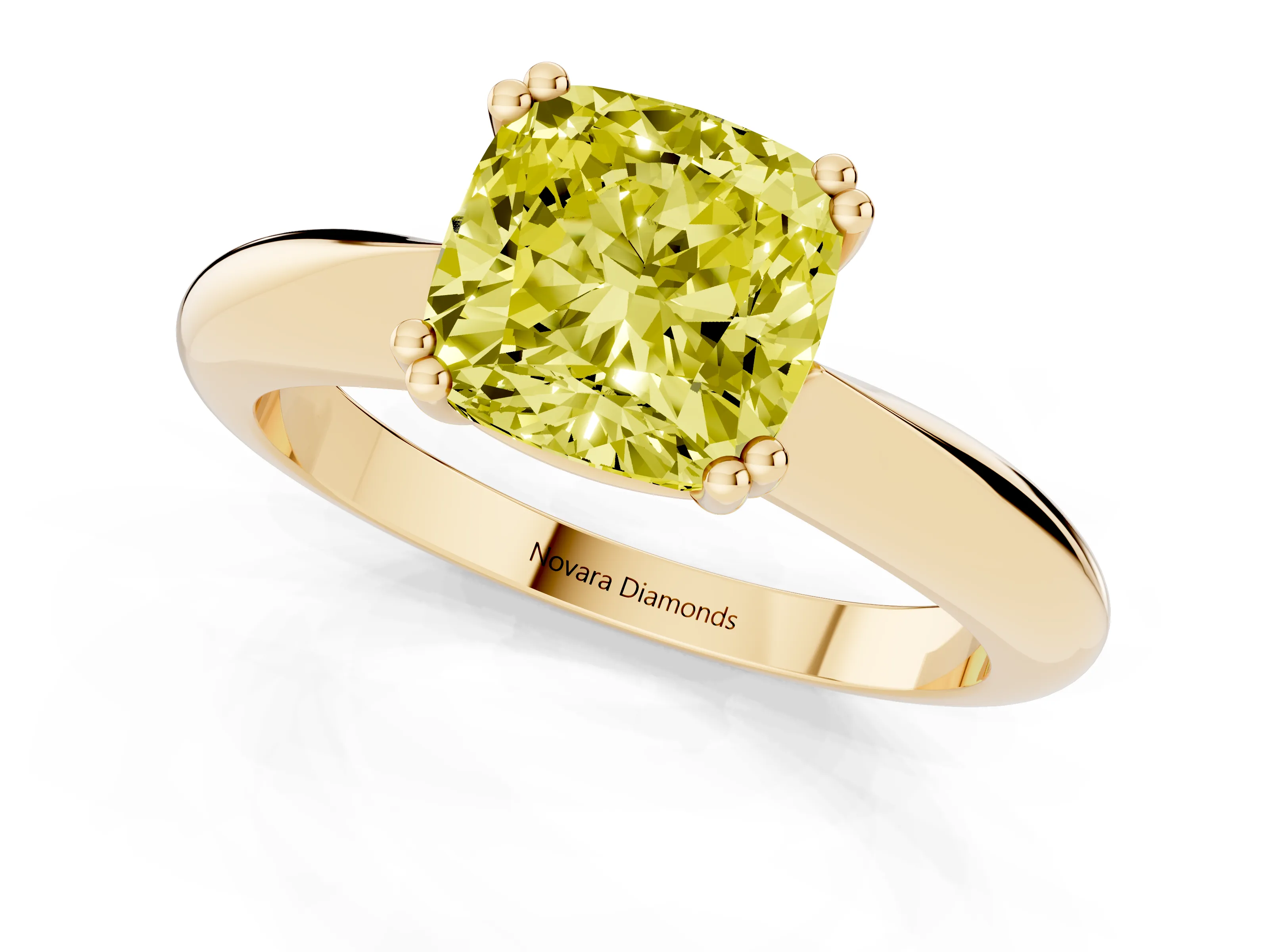 Fancy Yellow Cushion Cut Diamond Solitaire Engagement Ring Set in Yellow gold with Tapered Band and Prong Setting