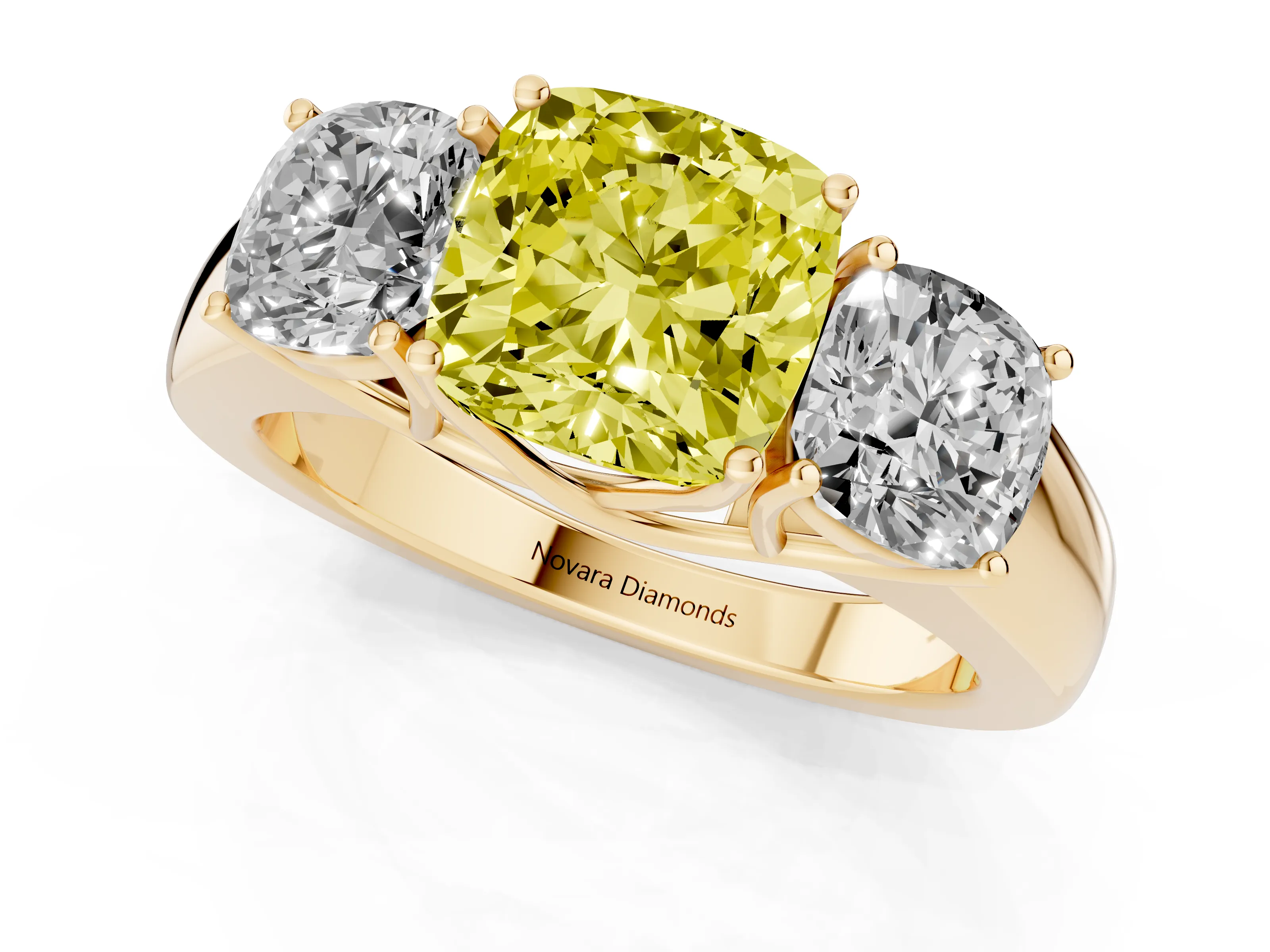 Fancy Yellow Three-Stone Cushion Cut Diamond Ring Set in Yellow gold with Matching Prong Settings and Plain Band