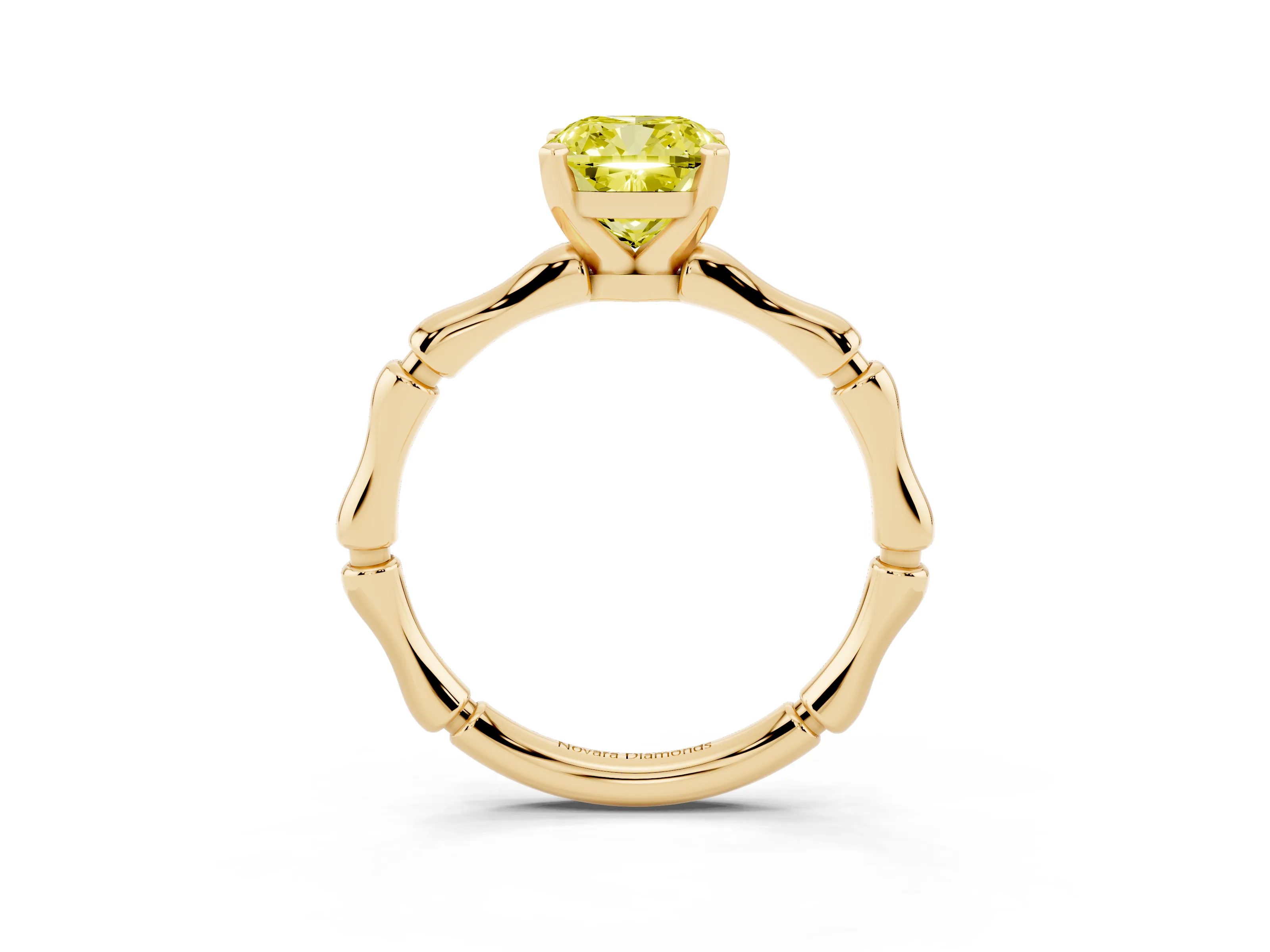 Fancy Yellow Cushion Cut Diamond Solitaire Ring Set in Yellow gold with Bamboo Band and Prong Setting