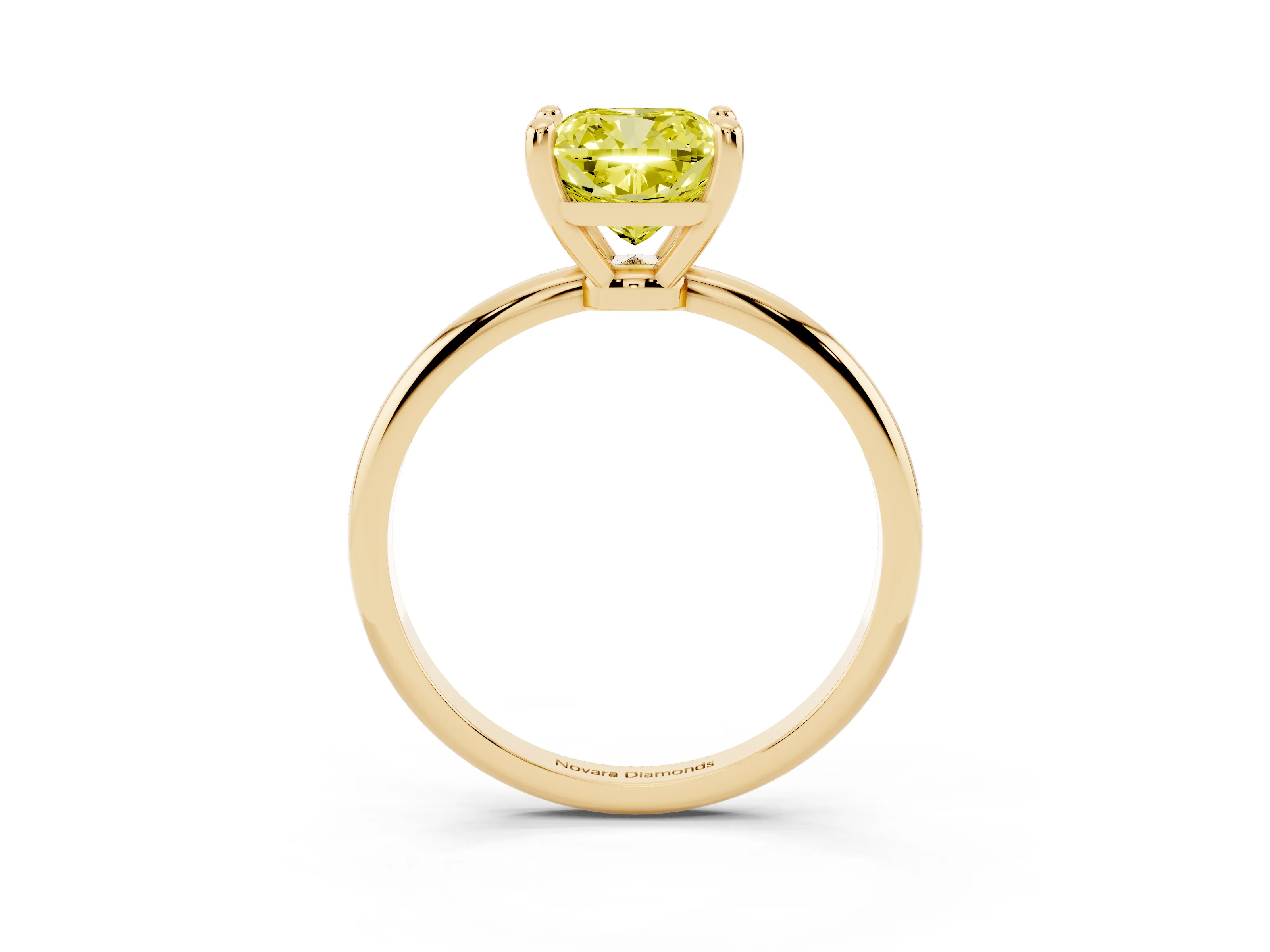Fancy Yellow Cushion Cut Diamond Solitaire Ring Set in Yellow gold with Secure Prong Setting on a Classic Band