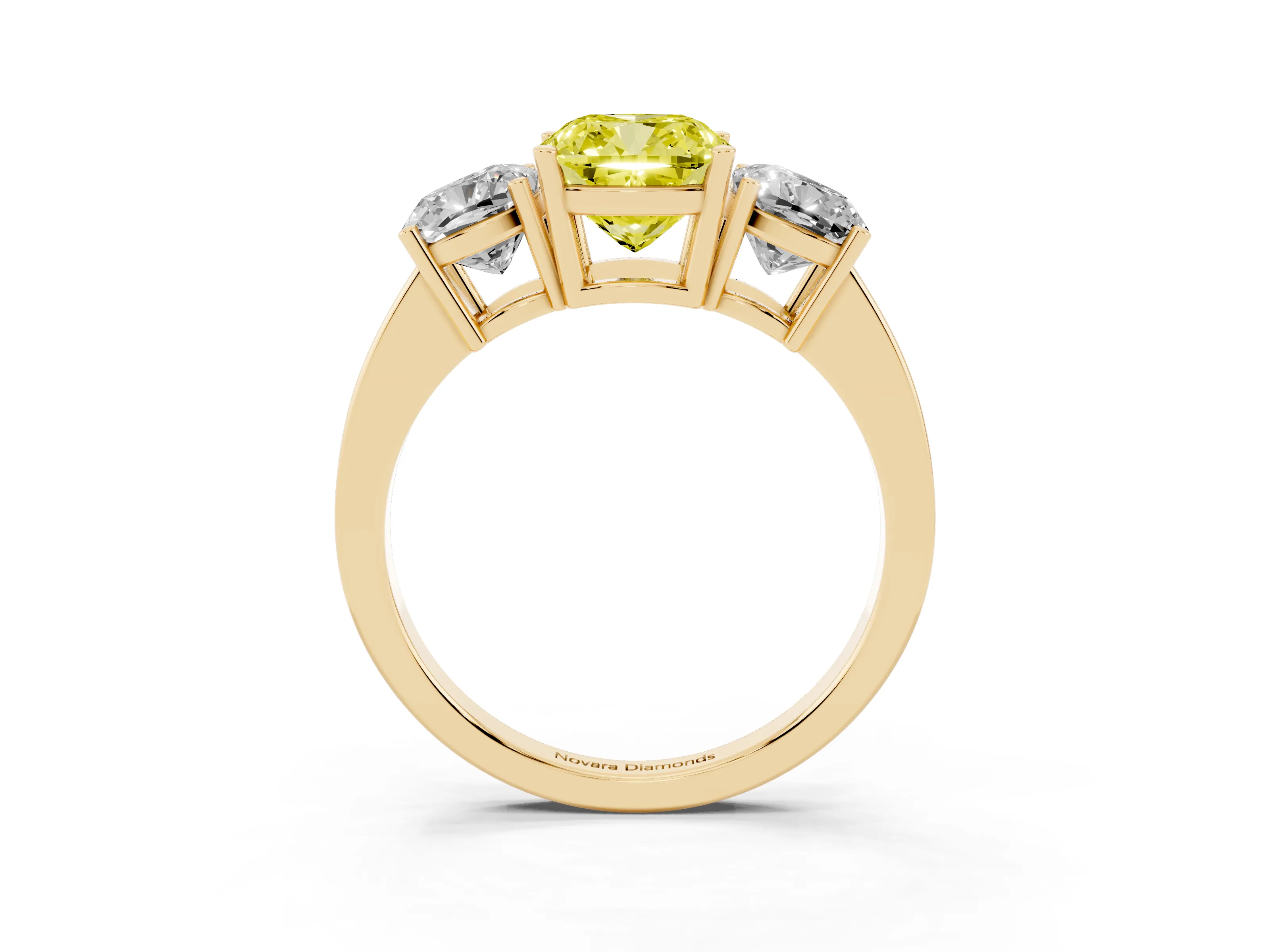 Fancy Yellow Cushion Cut Diamond Three-Stone Engagement Ring Set in Yellow gold with Flat Band