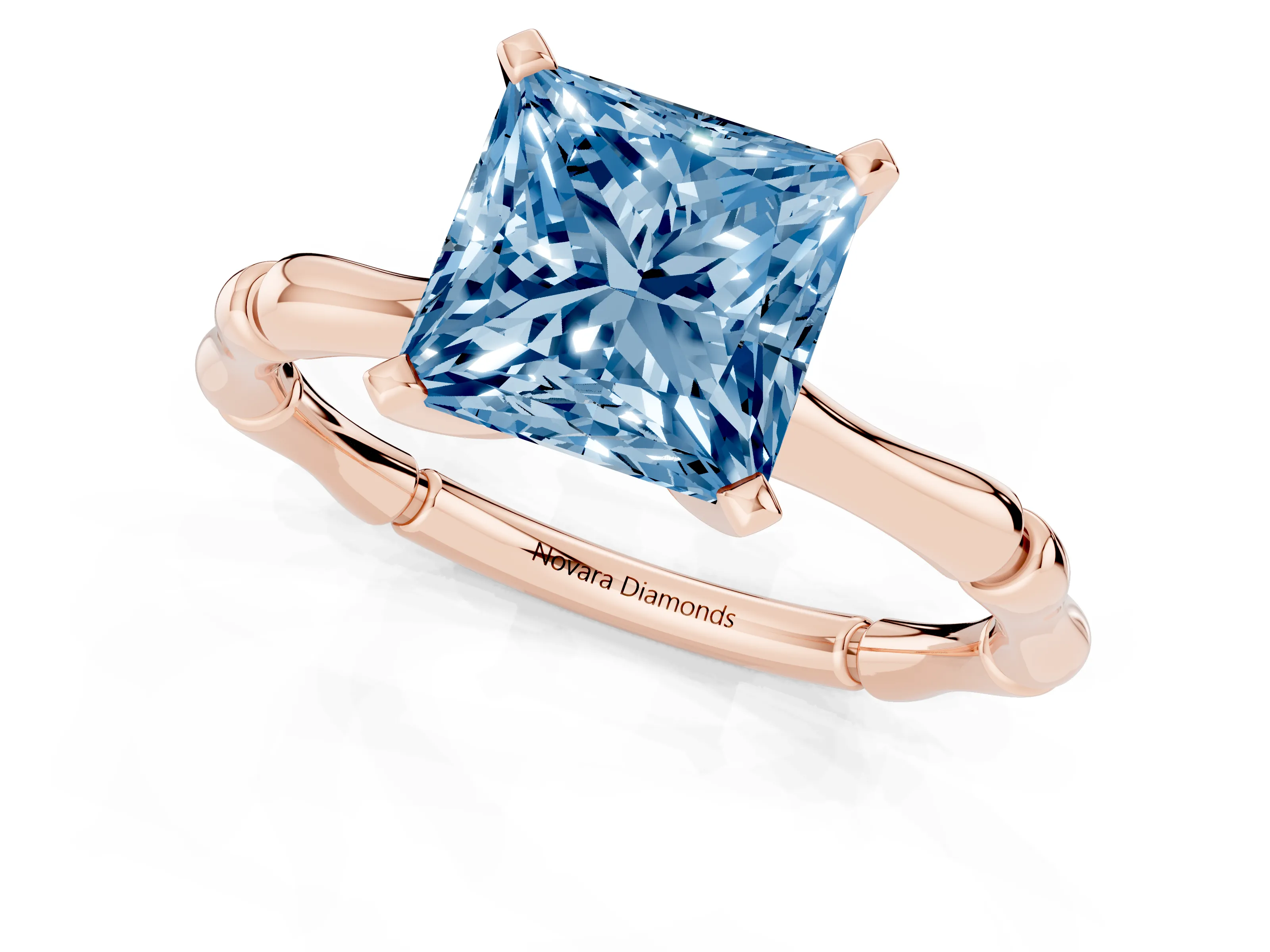 Fancy Blue Princess Cut Diamond Solitaire Ring Set in Rose gold with Bamboo Band and Prong Setting