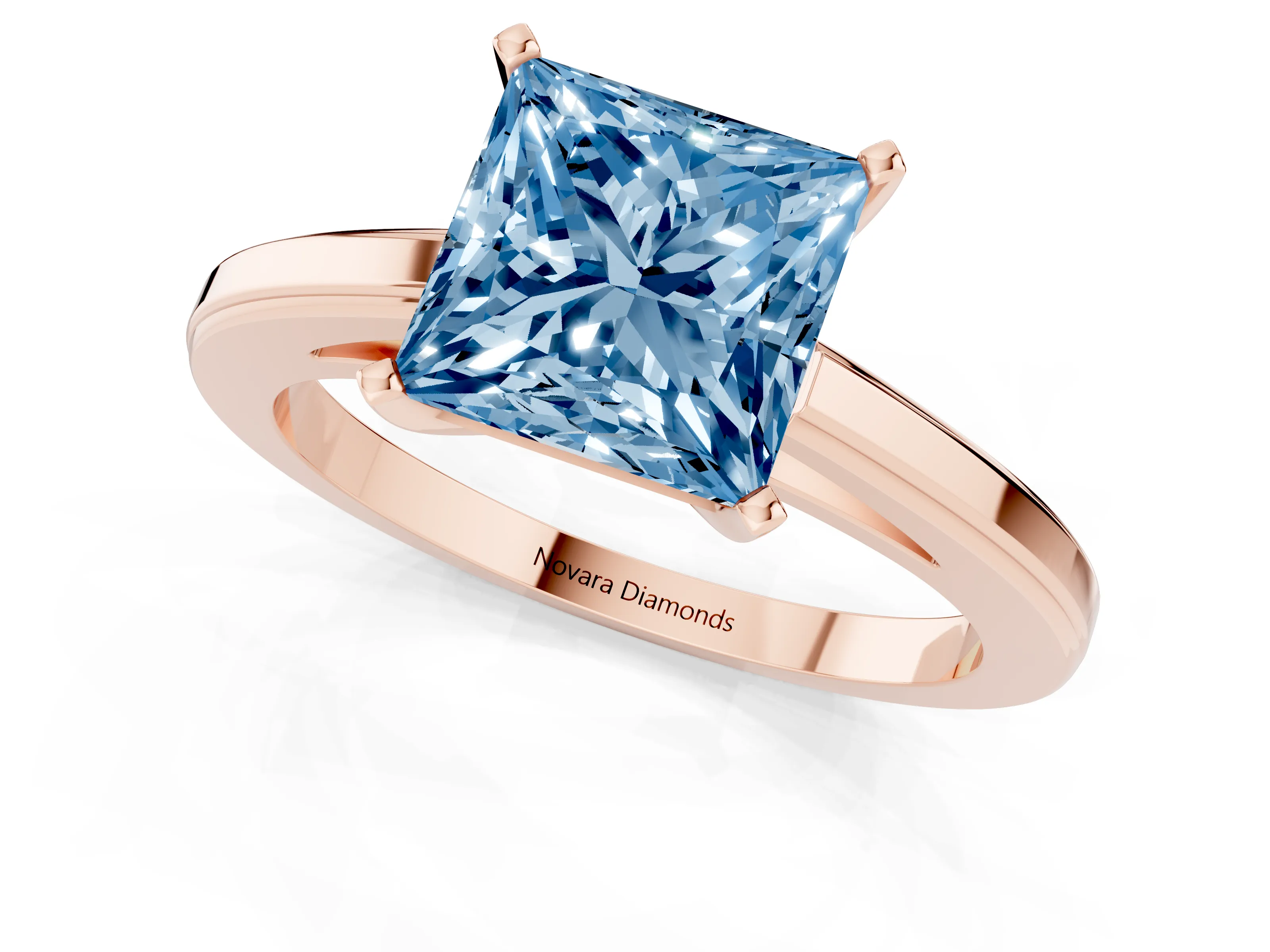 Fancy Blue Princess Cut Diamond Solitaire Ring Set in Rose gold with Prong Setting and Classic Band