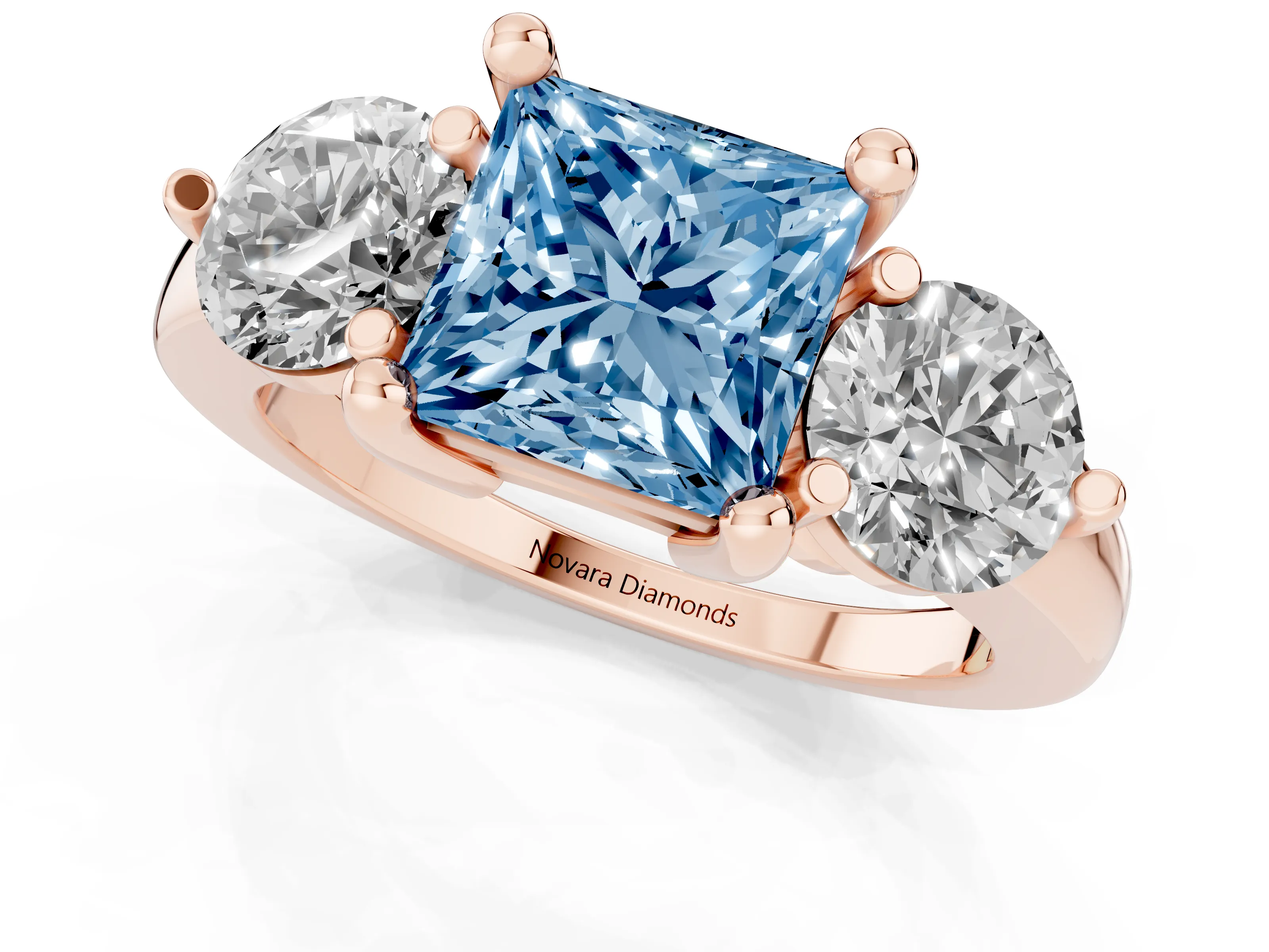 Fancy Blue Princess Cut Diamond Three-Stone Ring Set in Rose gold with Prong Setting and Classic Band
