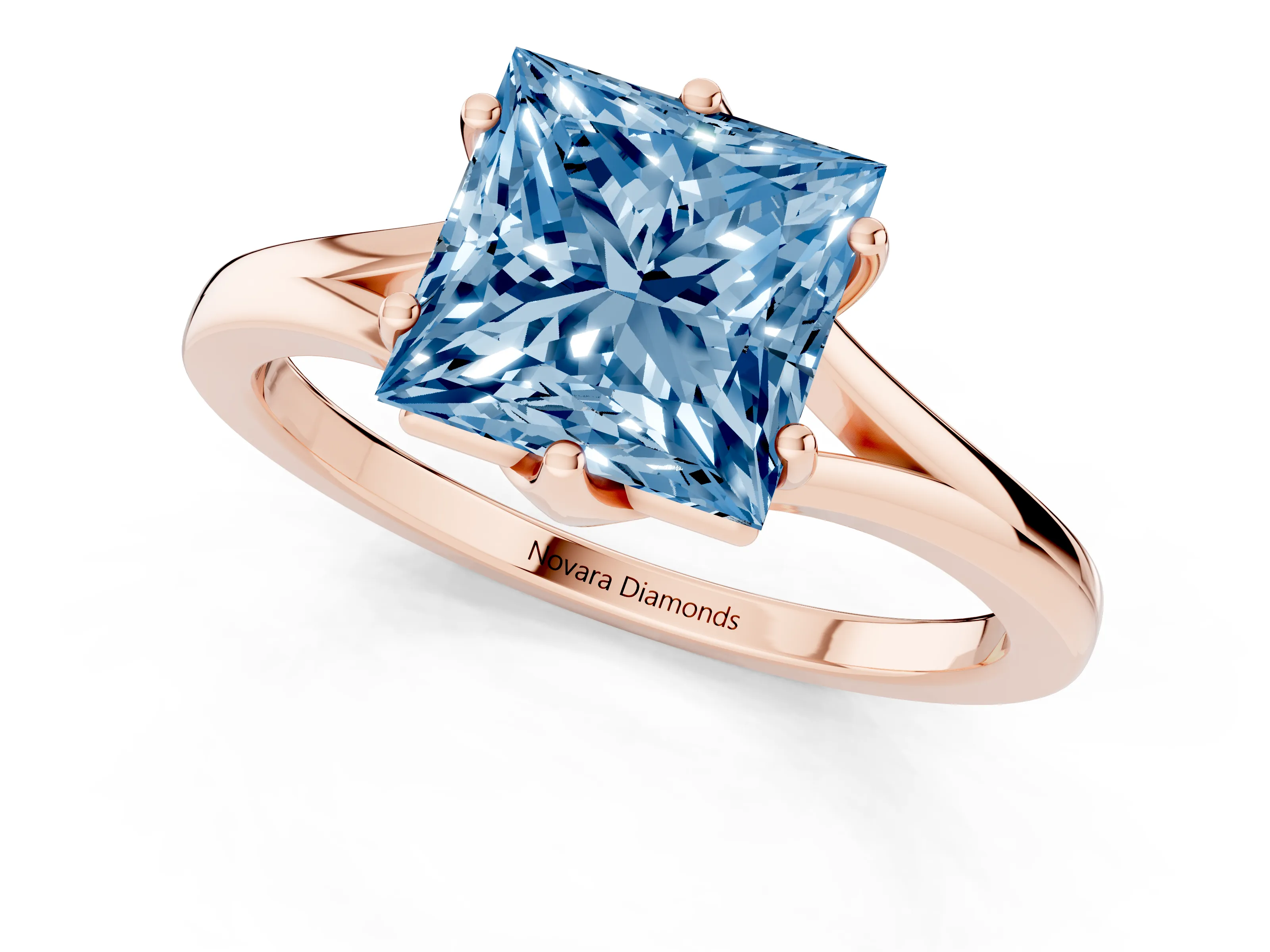 Fancy Blue Princess Cut Diamond Solitaire Ring Set in Rose gold with Polished Tapered Band and Prong Setting