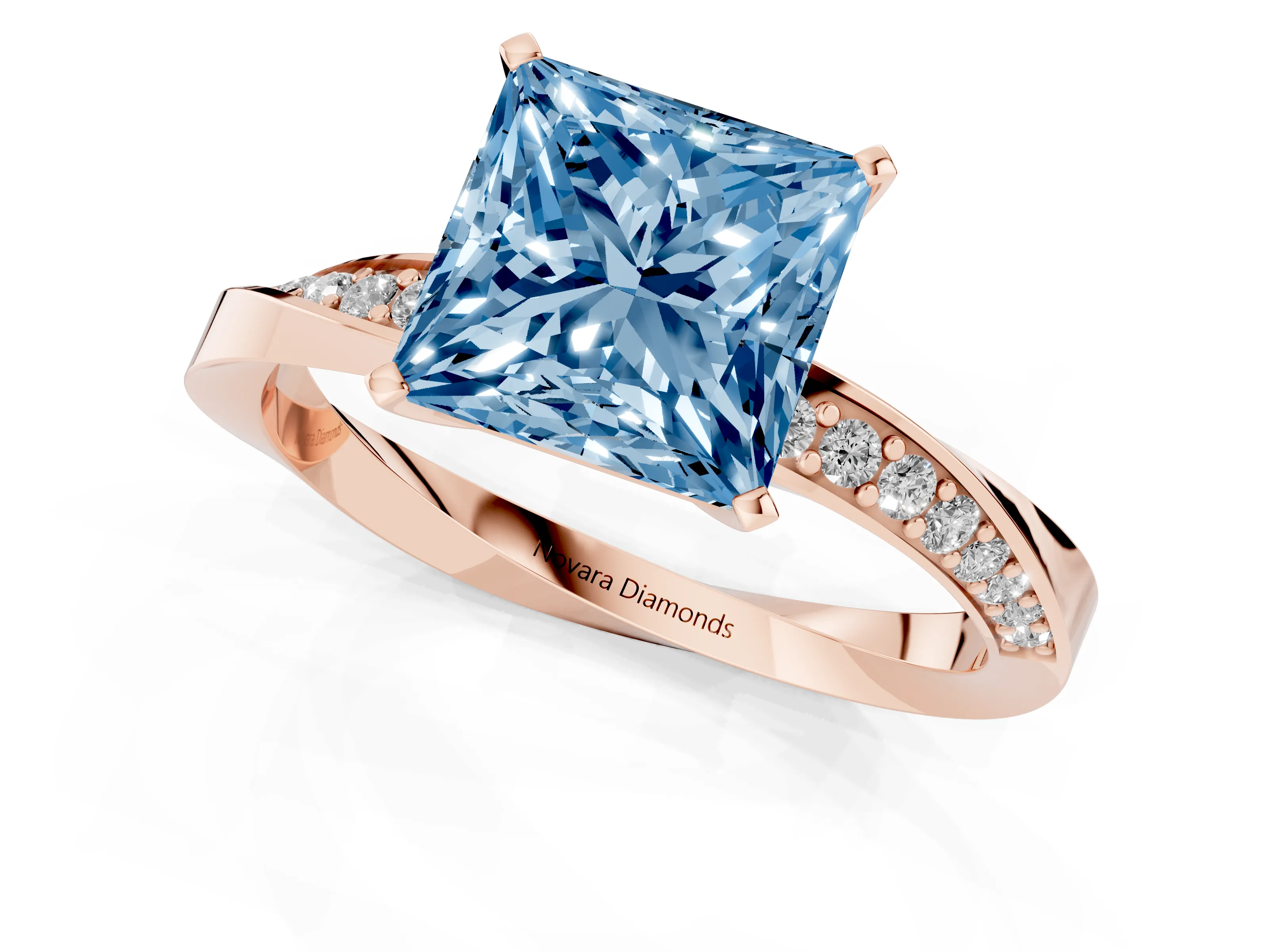 Fancy Blue Princess Cut Diamond Engagement Ring Set in Rose gold with Side Stone Accents and Prong Setting