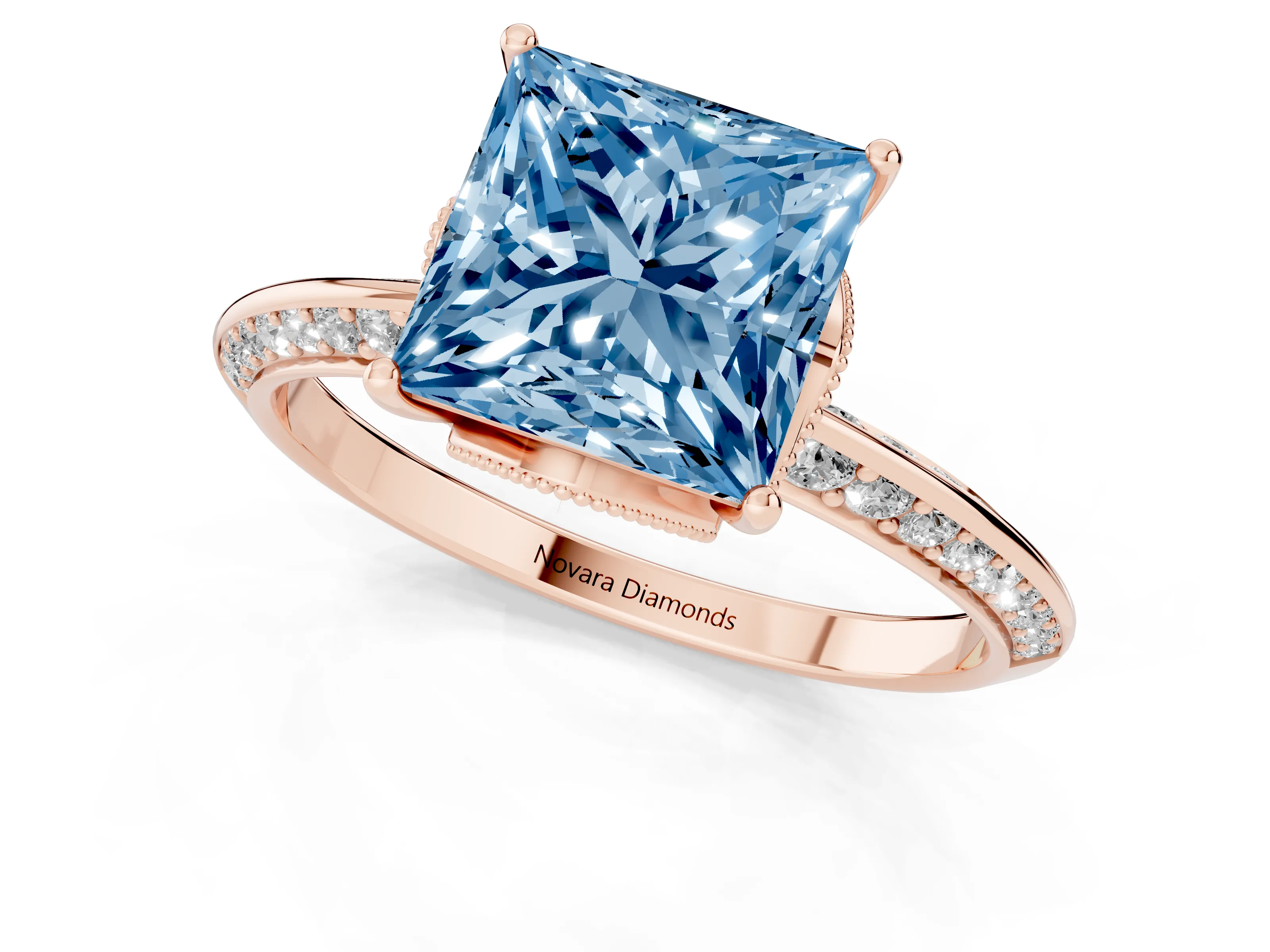 Fancy Blue Princess Cut Diamond Solitaire Engagement Ring Set in Rose gold with Pavé Split Shank and Prong Setting