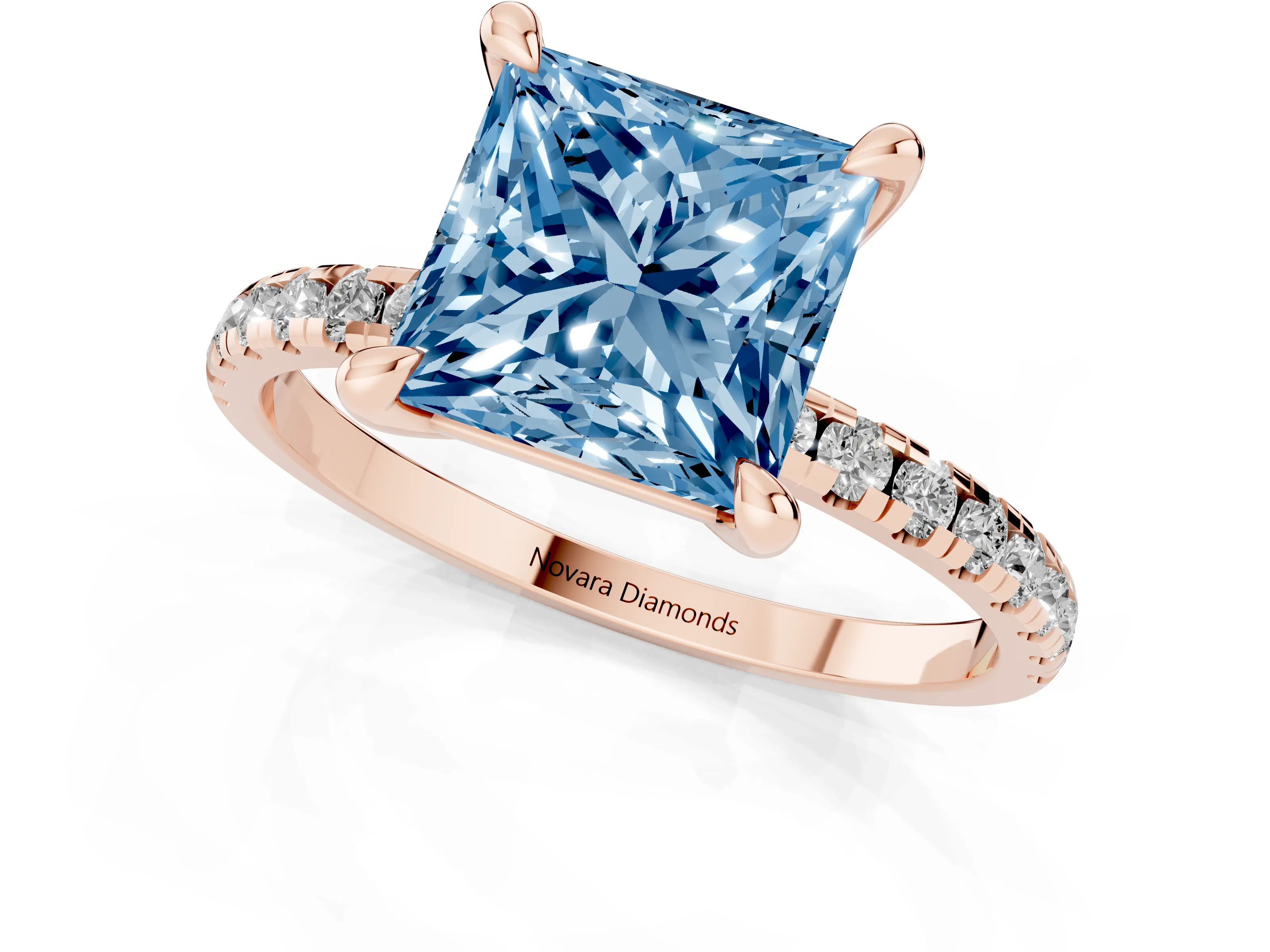 Fancy Blue Princess Cut Diamond Brilliant Solitaire Ring Set in Rose gold with Pavé Band and Prong Setting