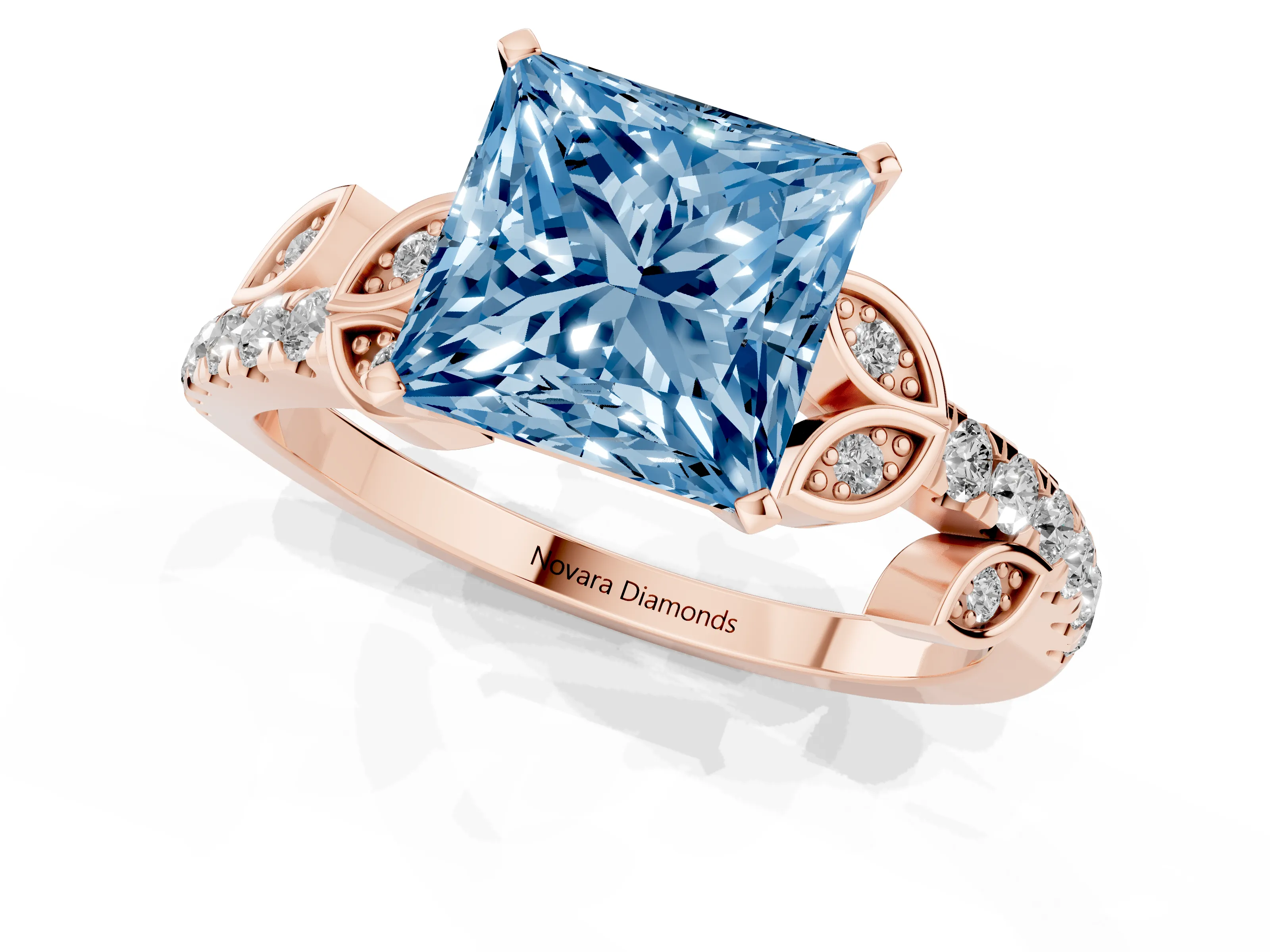 Fancy Blue Princess Cut Diamond Solitaire Leaf-Inspired Ring Set in Rose gold with Pavé Band and Prong Setting