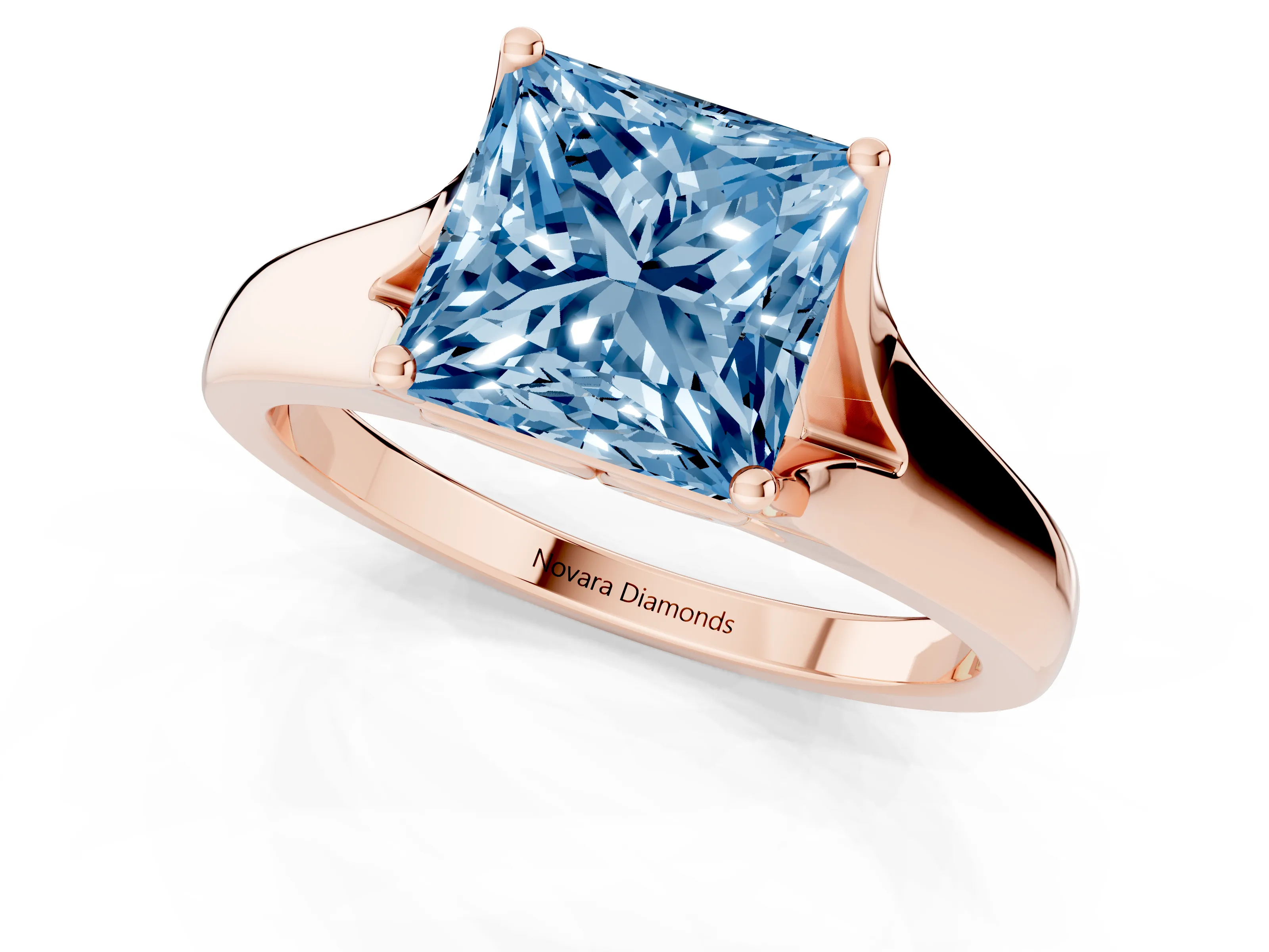 Fancy Blue Princess Cut Diamond Solitaire Ring Set in Rose gold with Arched Cathedral Band and Prong Setting