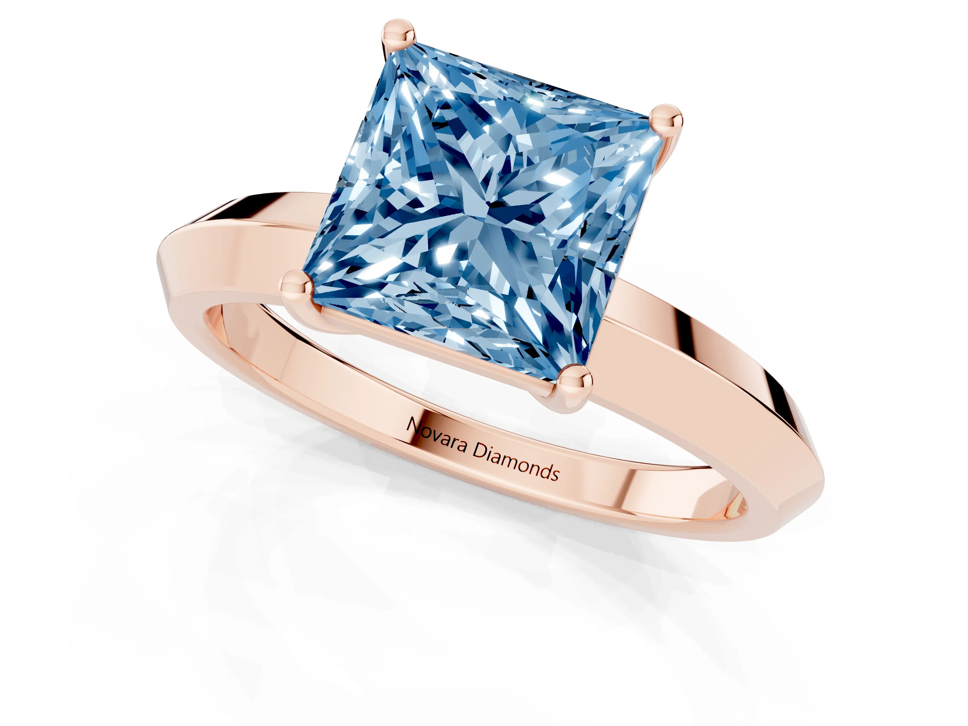 Fancy Blue Princess Cut Diamond Solitaire Engagement Ring Set in Rose gold with Flat Band and Prong Setting