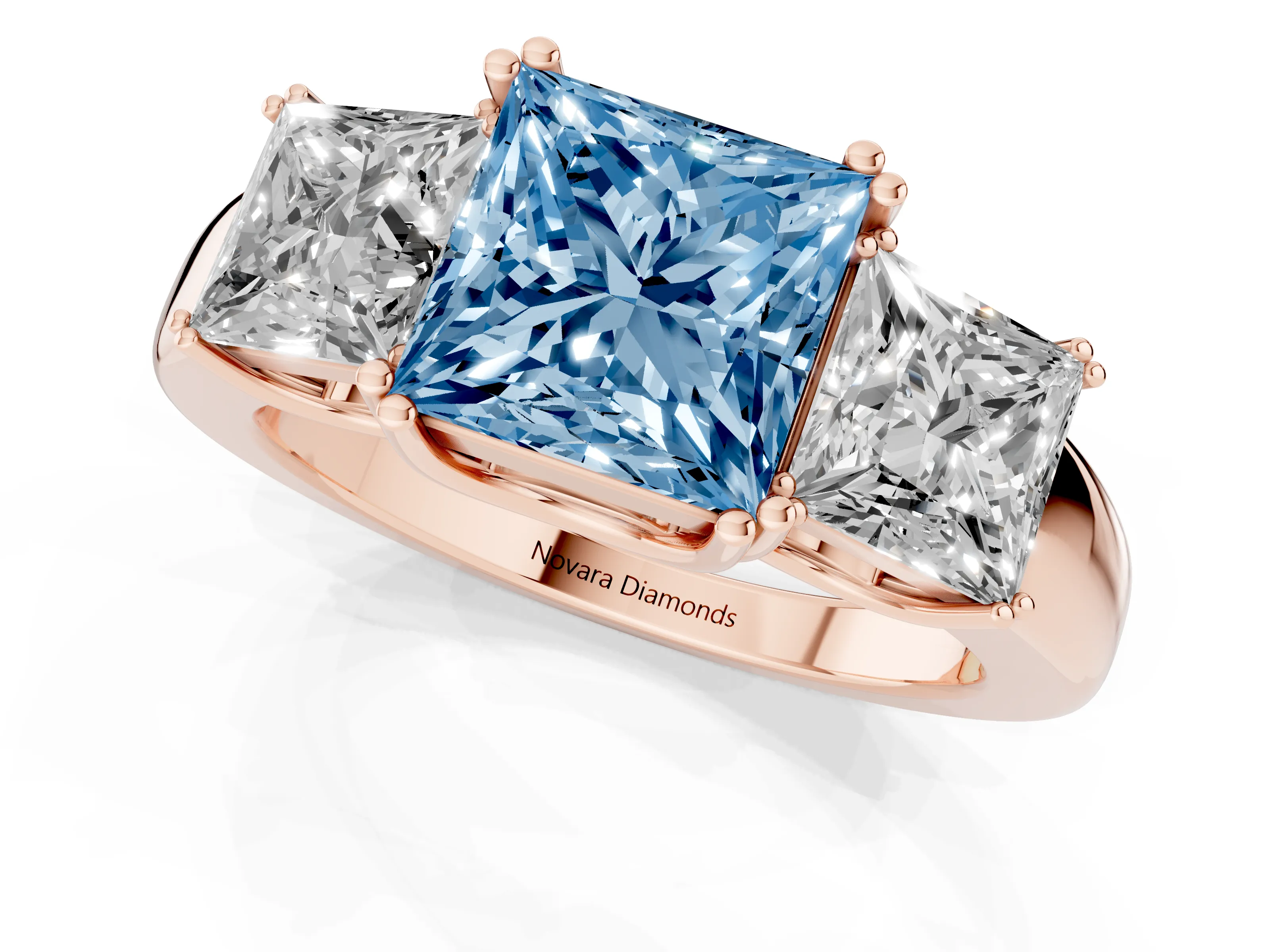 Fancy Blue Princess Cut Diamond Three-Stone Ring Set in Rose gold with Polished Channel-Set Band