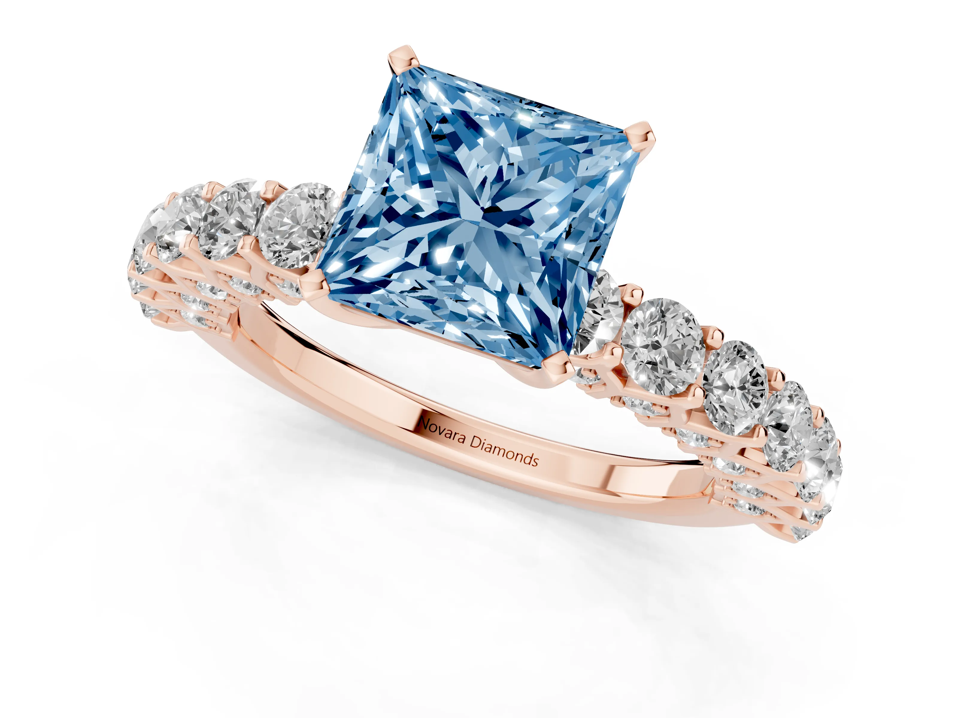 Fancy Blue Princess Cut Diamond Solitaire Ring Set in Rose gold with Shared Prong Pavé Band