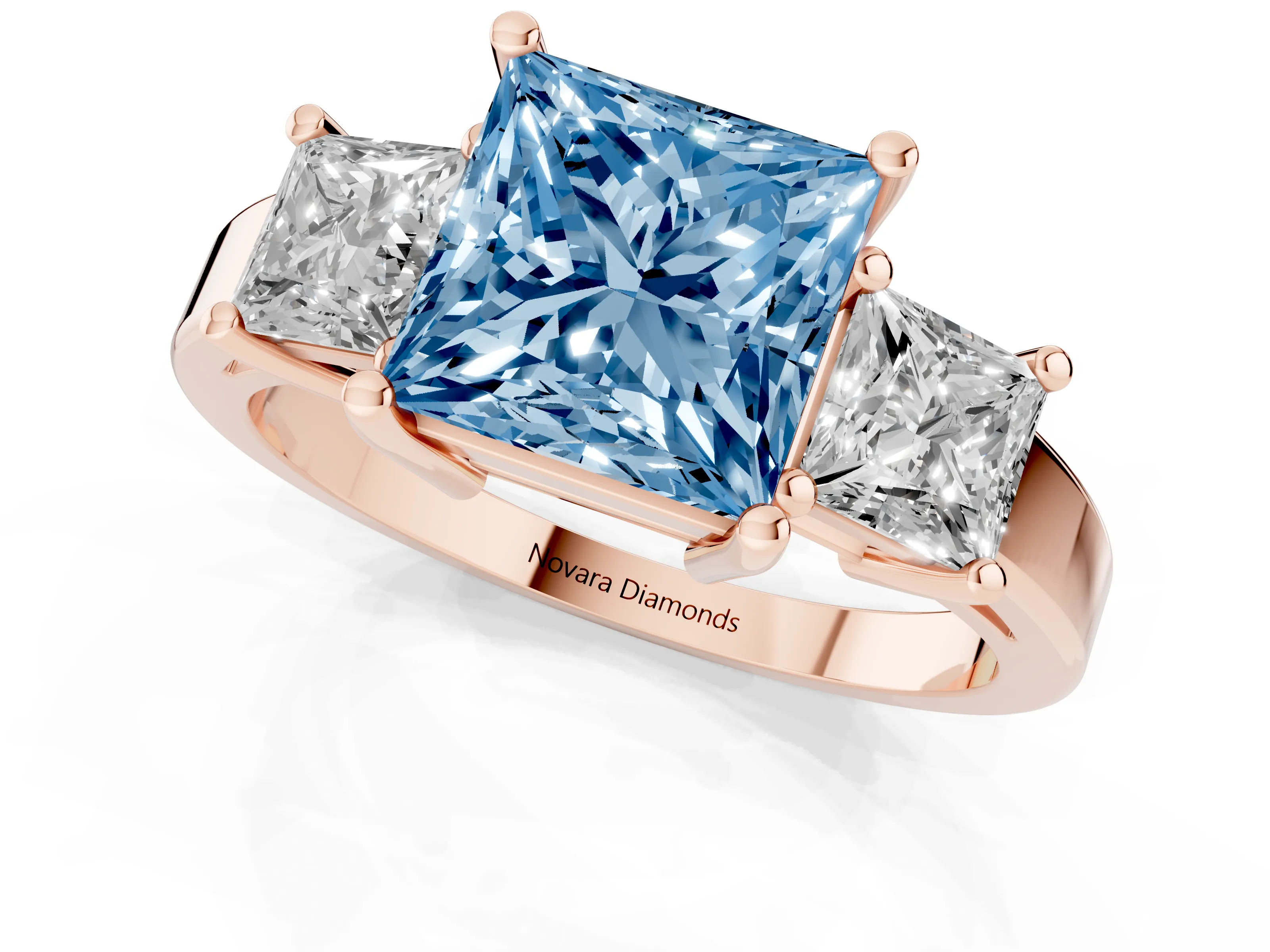 Fancy Blue Three-Stone Princess Cut Diamond Solitaire Ring Set in Rose gold with Prong Setting