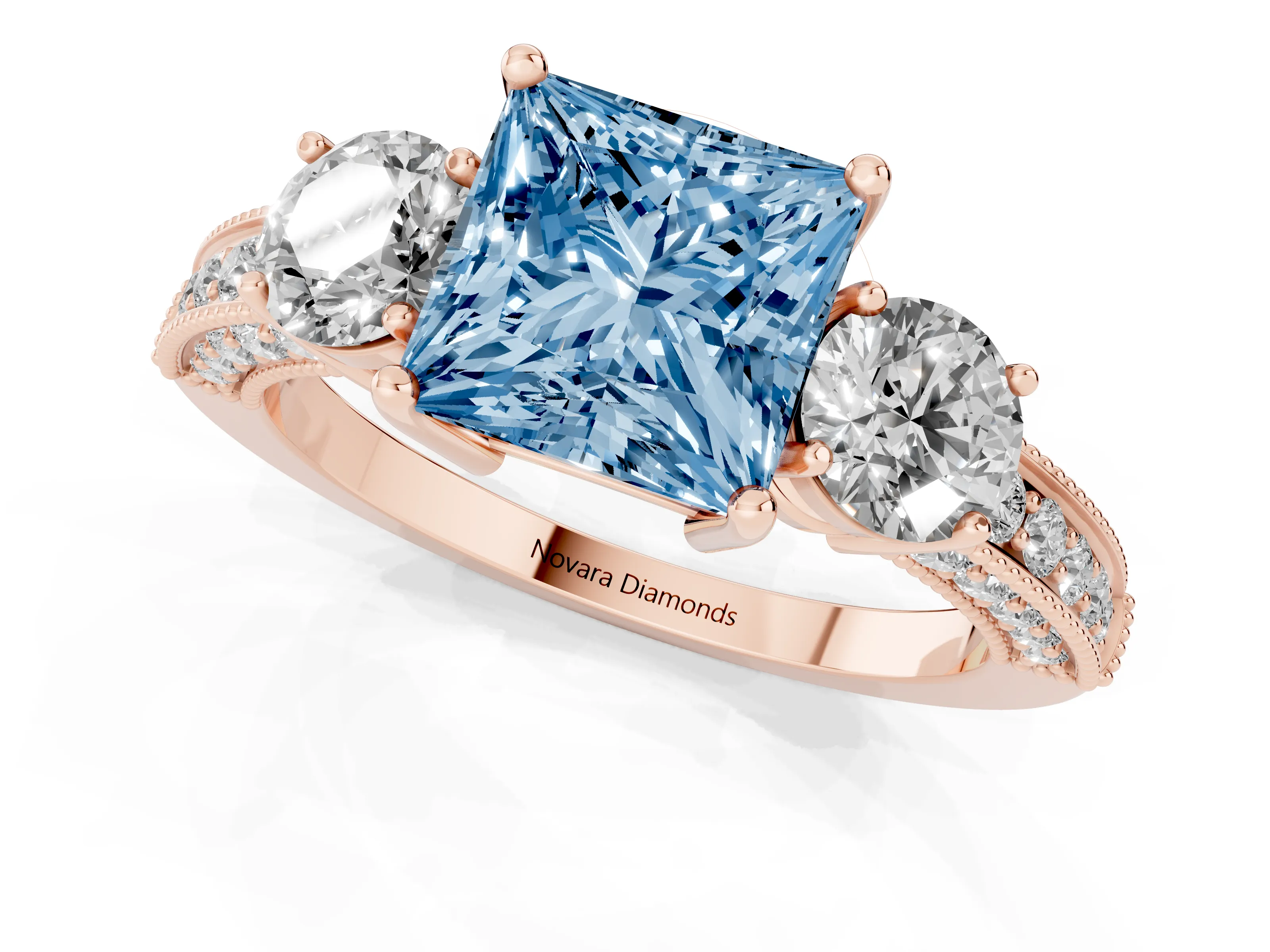 Fancy Blue Princess Cut Diamond Three-Stone Ring Set in Rose gold with Round Side Stones and Pavé Band