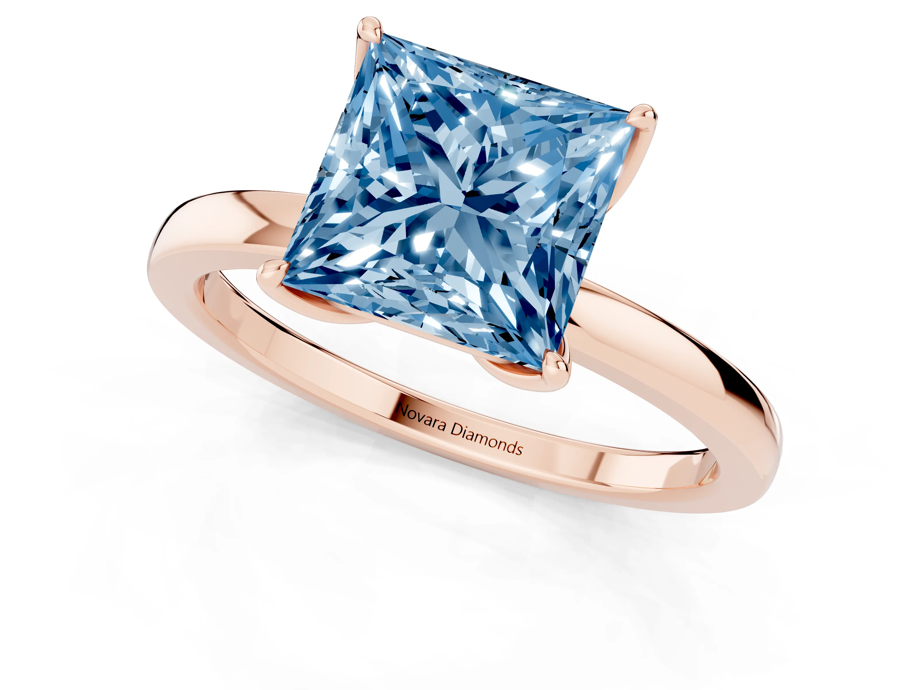 Fancy Blue Princess Cut Diamond Solitaire Ring Set in Rose gold with Prong Setting and Thin Polished Band