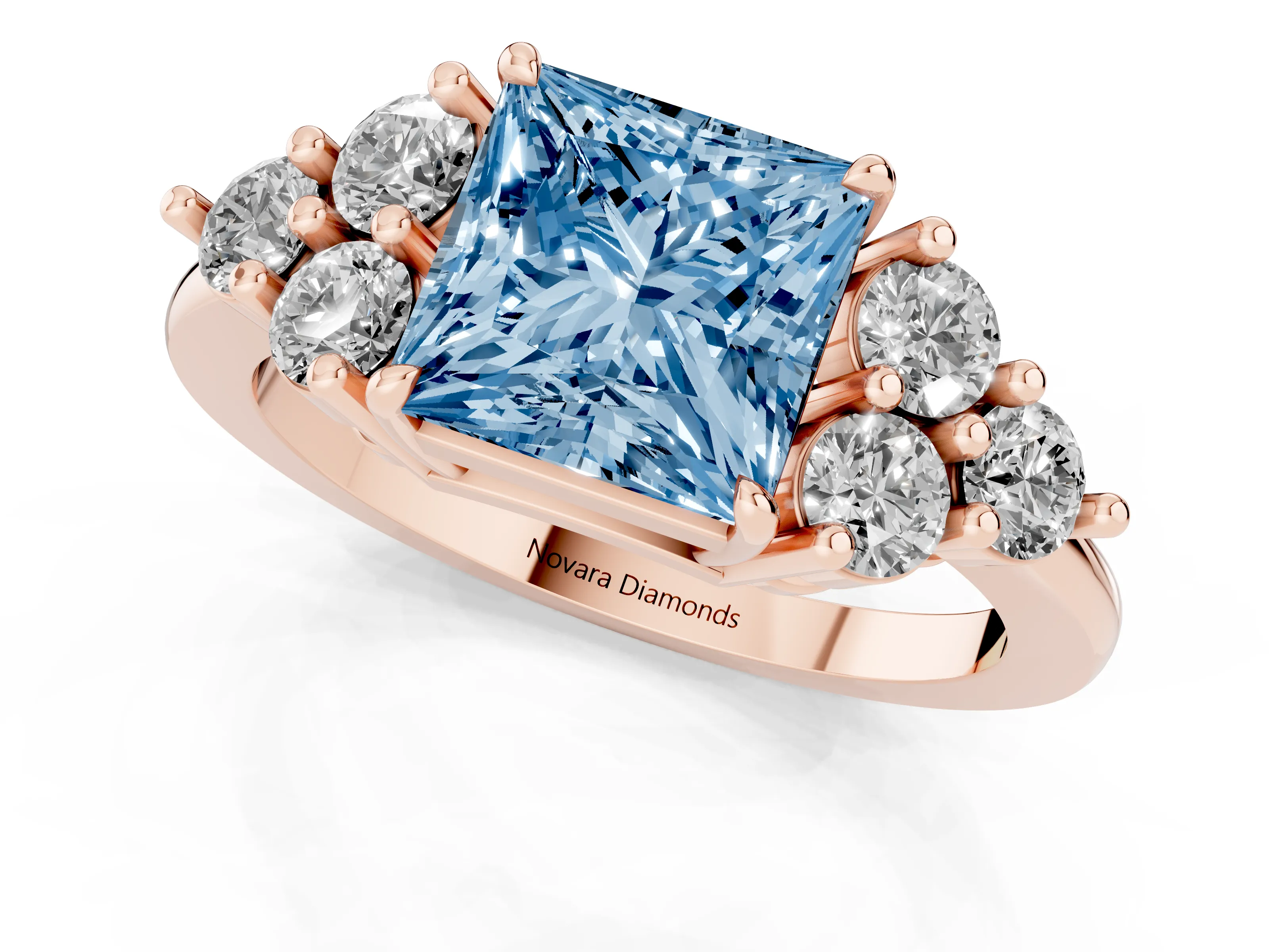 Fancy Blue Princess Cut Diamond Solitaire Ring Set in Rose gold with Cluster Accents on Each Side