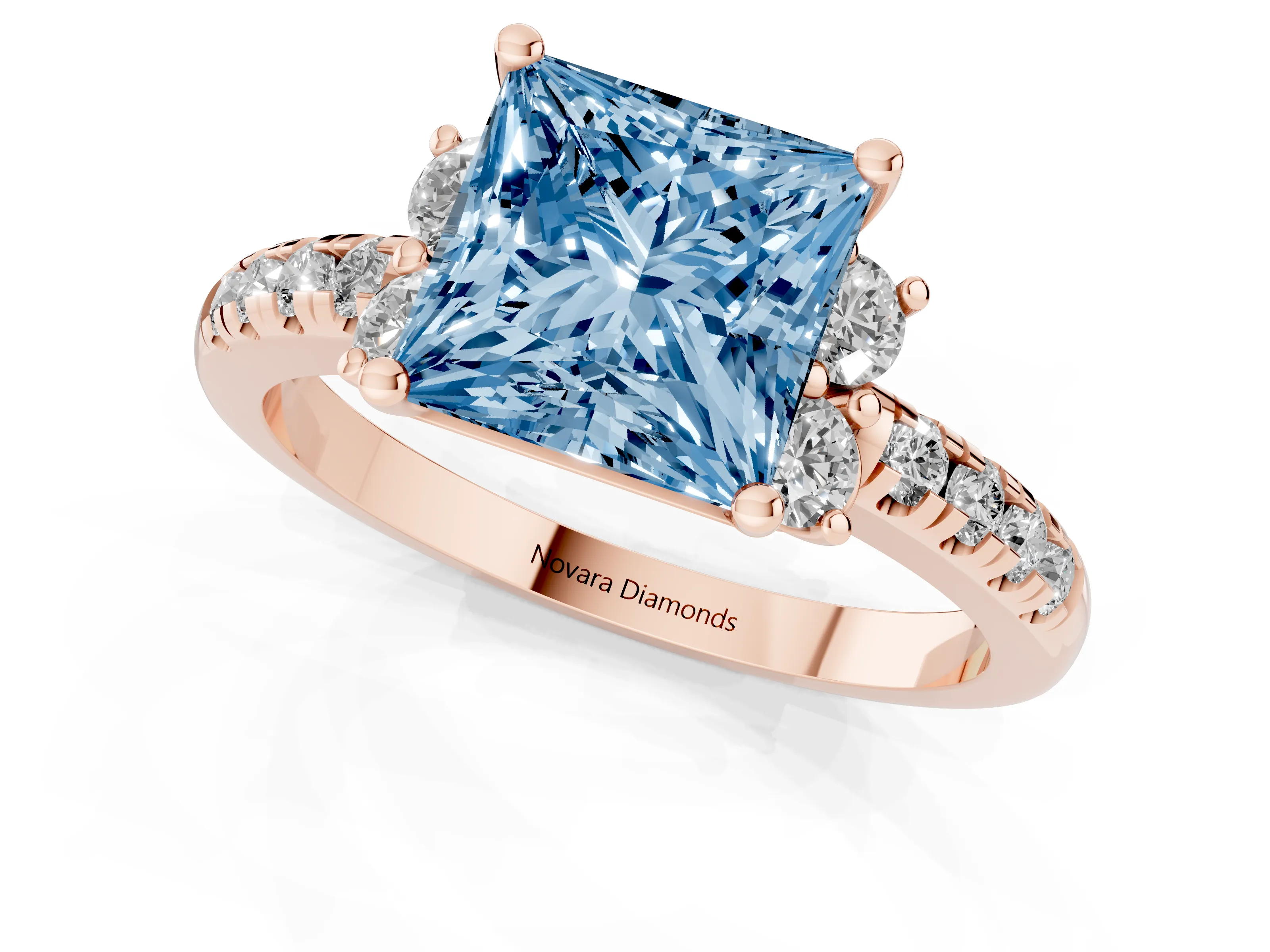 Fancy Blue Princess Cut Diamond Three-Stone Pavé Ring Set in Rose gold with Prong Setting