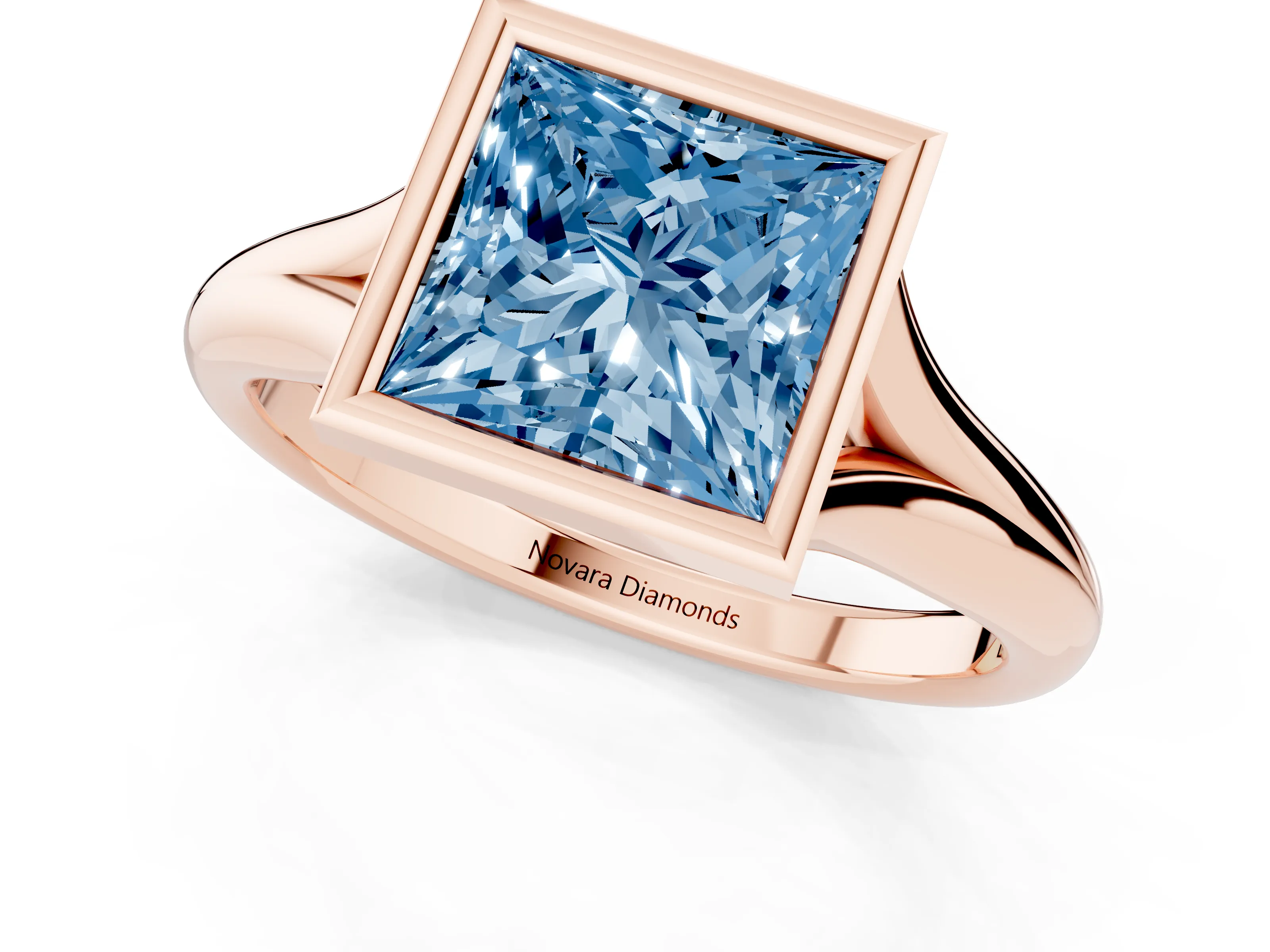 Fancy Blue Bezel Set Princess Cut Diamond Solitaire Ring Set in Rose gold with Smooth Band