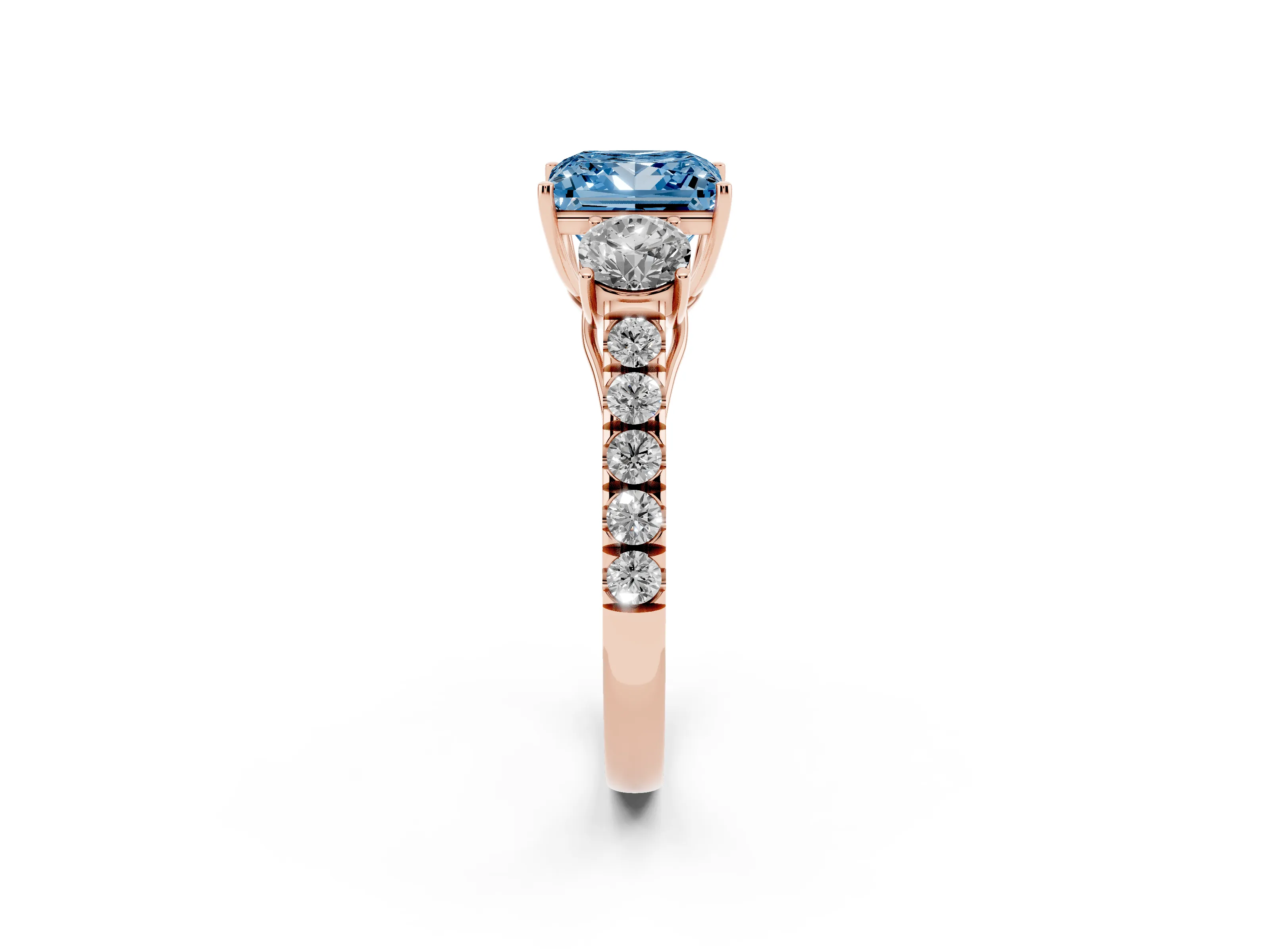 Fancy Blue Princess Cut Diamond Three-Stone Ring Set in Rose gold with Round Side Stones and Delicate Pavé Band