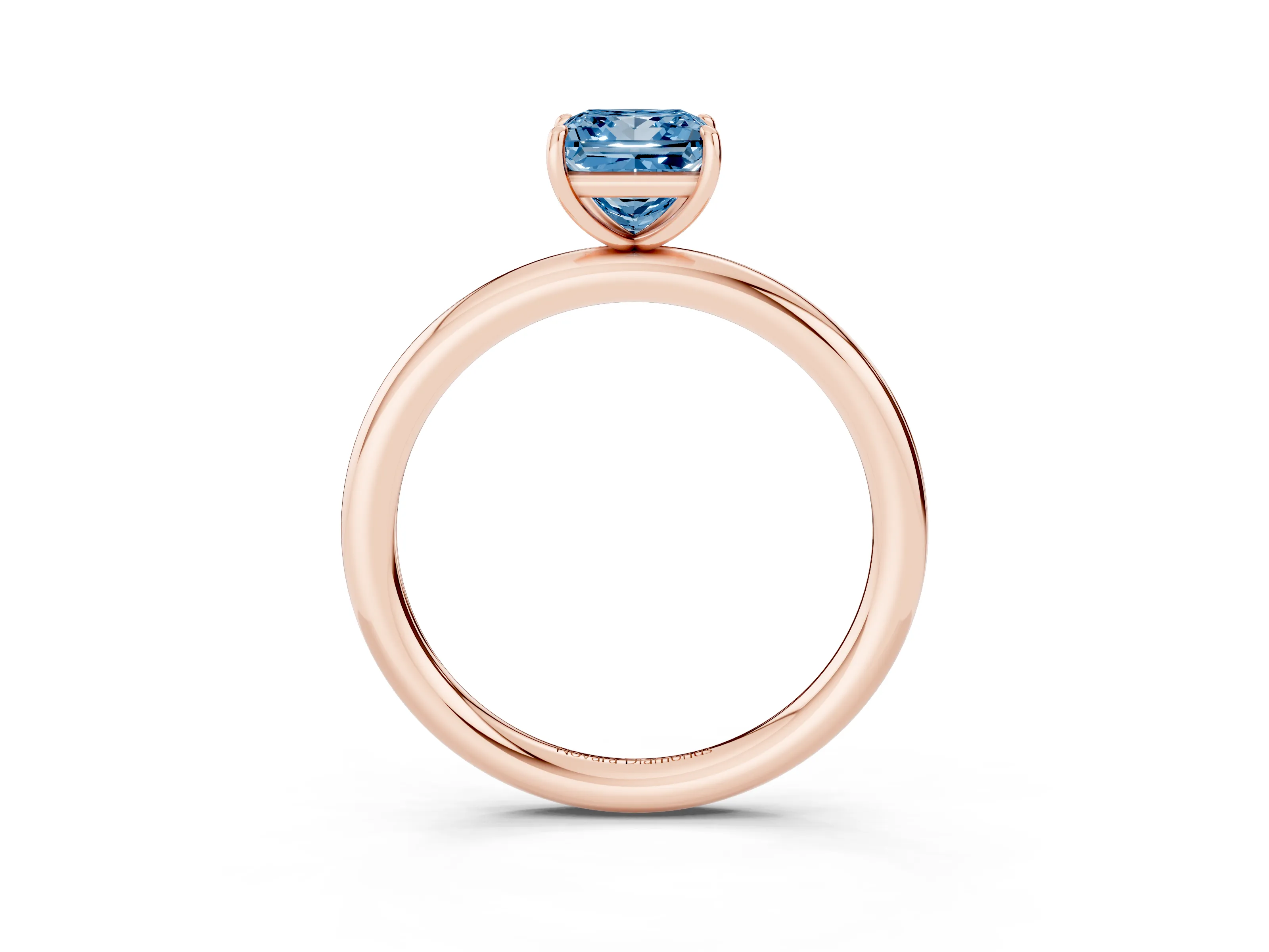 Fancy Blue Princess Cut Diamond Solitaire Ring Set in Rose gold with Prong Setting on a Polished Plain Band