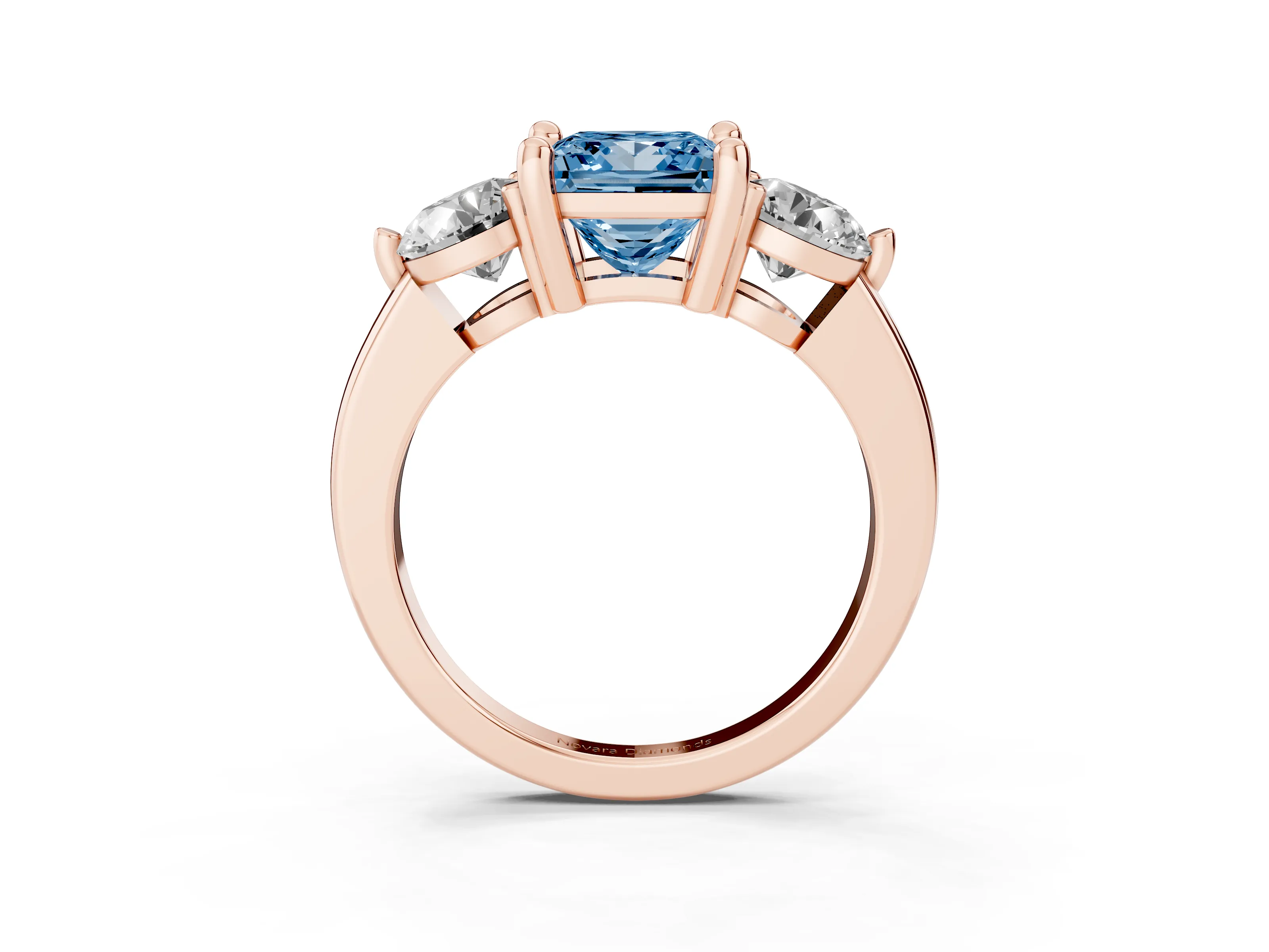 Fancy Blue Princess Cut Diamond Three-Stone Ring Set in Rose gold with Prong Setting and Classic Band