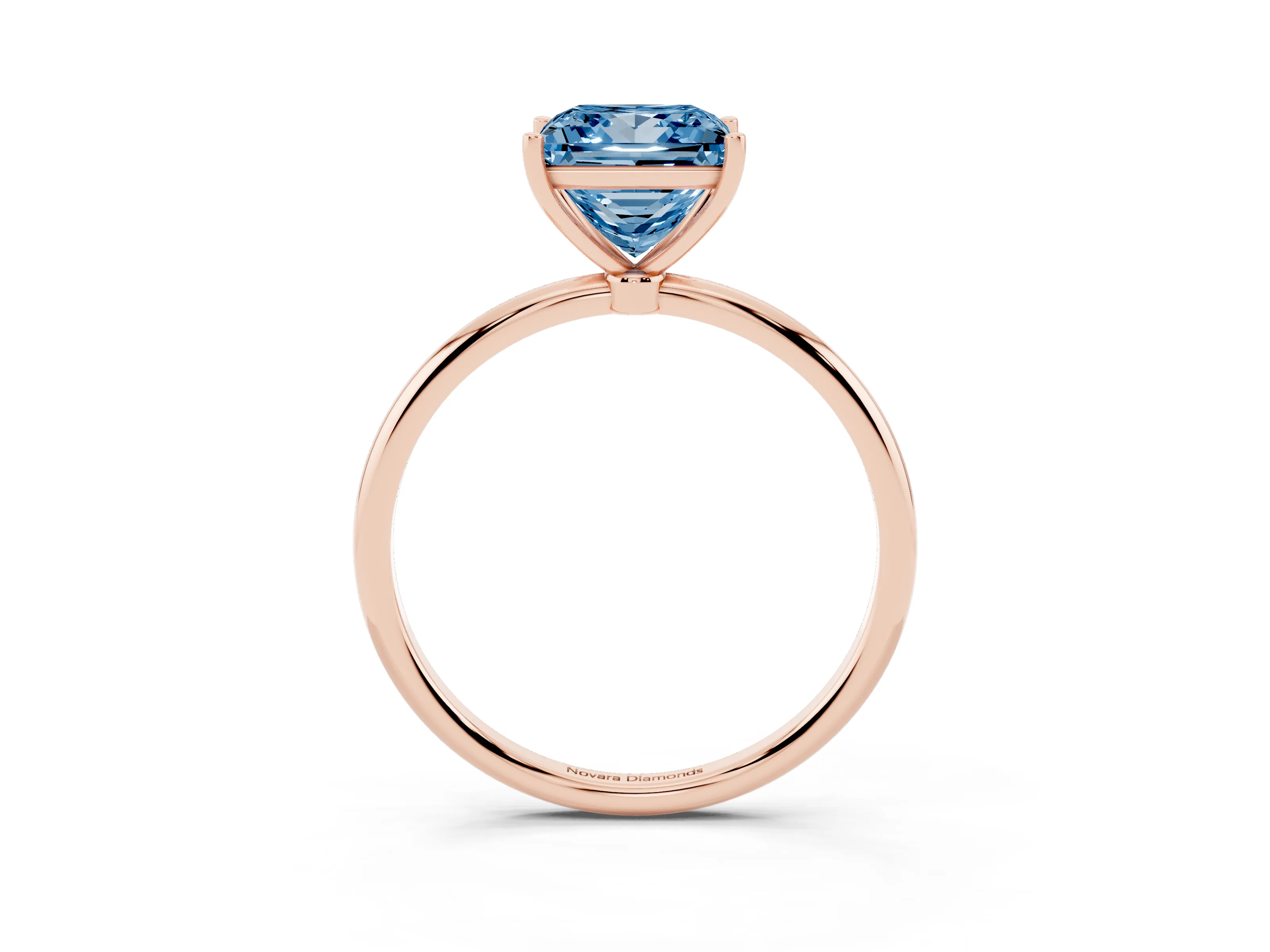 Fancy Blue Princess Cut Diamond Solitaire Engagement Ring Set in Rose gold with Thin Band and Prong Setting