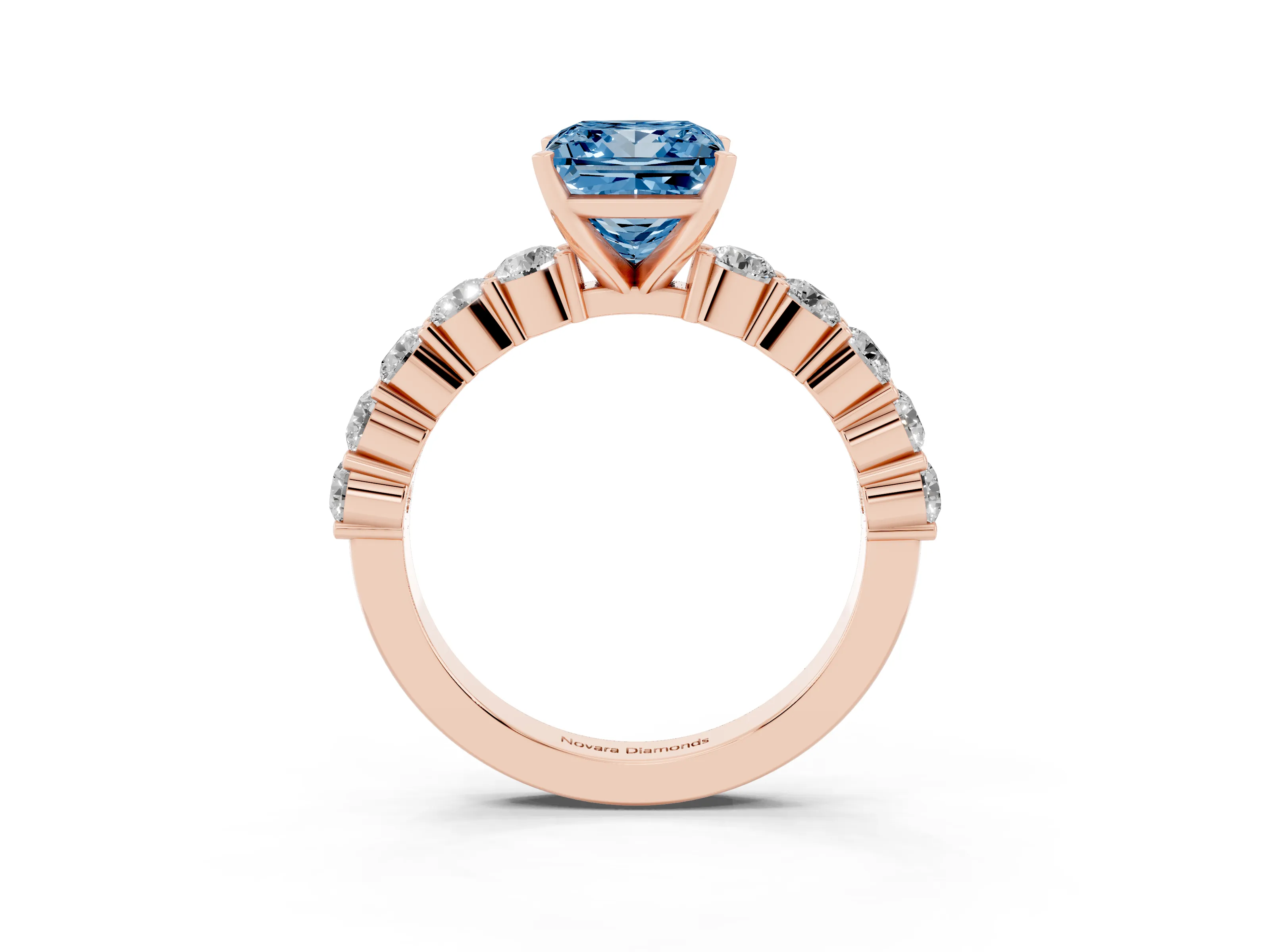 Fancy Blue Princess Cut Diamond Solitaire Ring Set in Rose gold with Shared Prong Round Side Stones